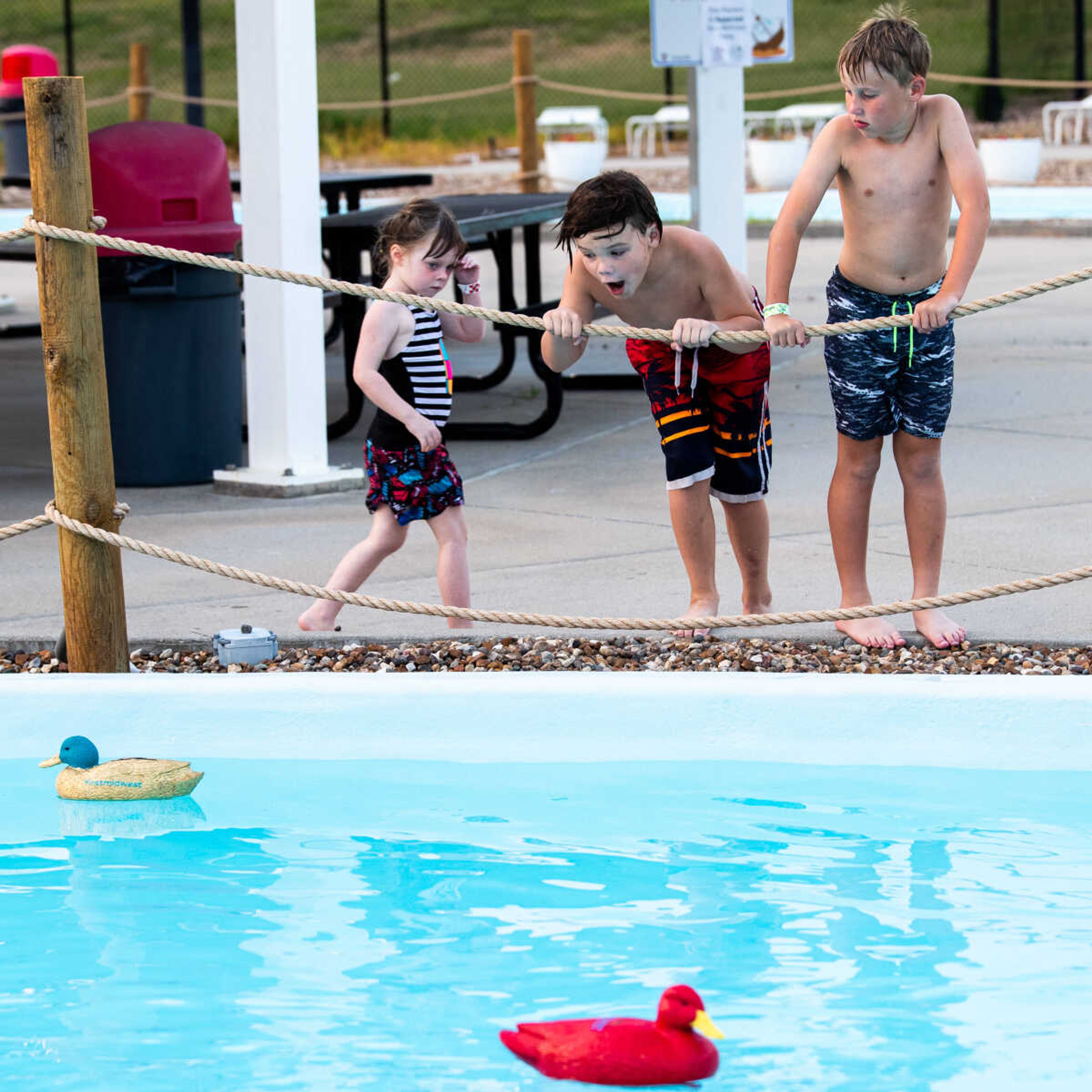 Leo Woods, 8, and Griffin Preusser, 9, cheer on the ducks at the Duck Regatta on Saturday, July 15 at Cape Splash.