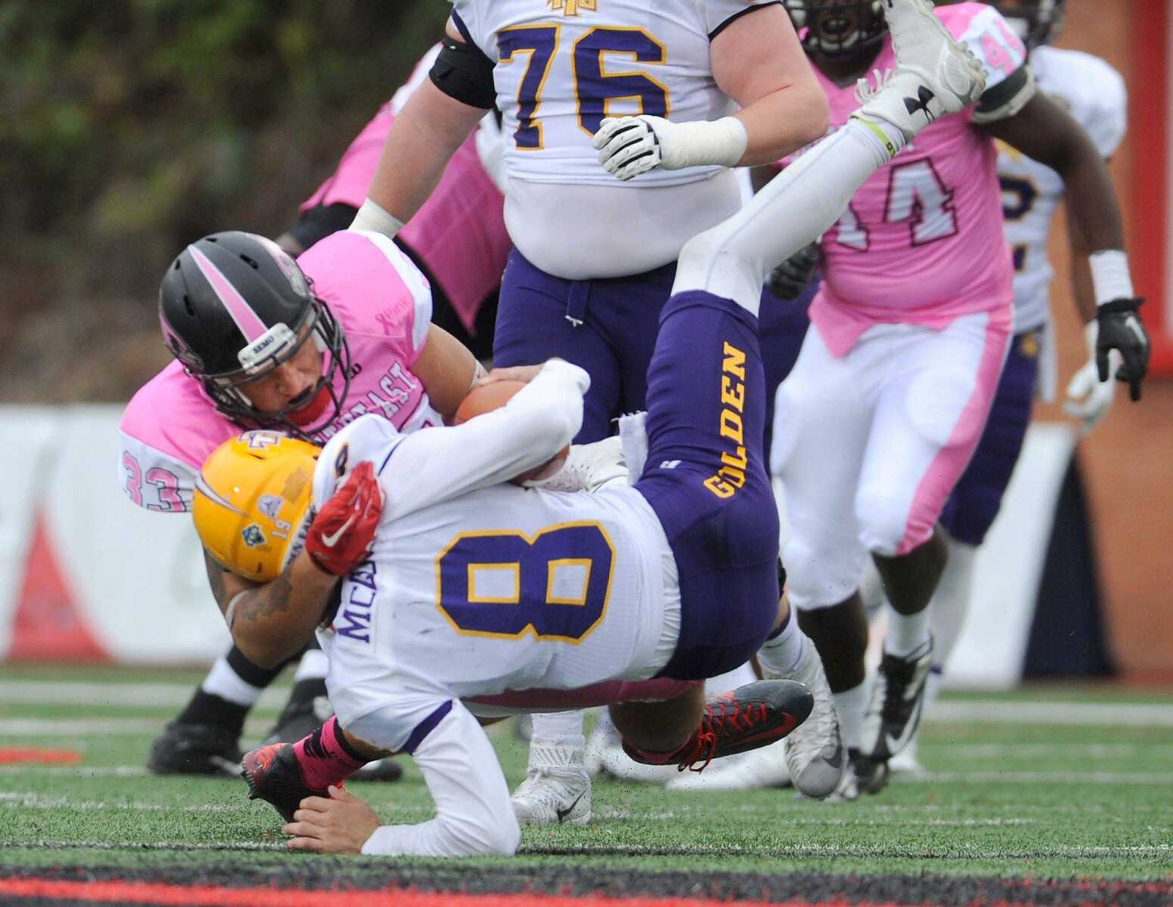 Tennessee Tech quarterback Brock McCoin is sacked by Southeast Missouri State's Stephon Williams during the third quarter Saturday, Oct. 31, 2015 at Houck Stadium. (Fred Lynch)