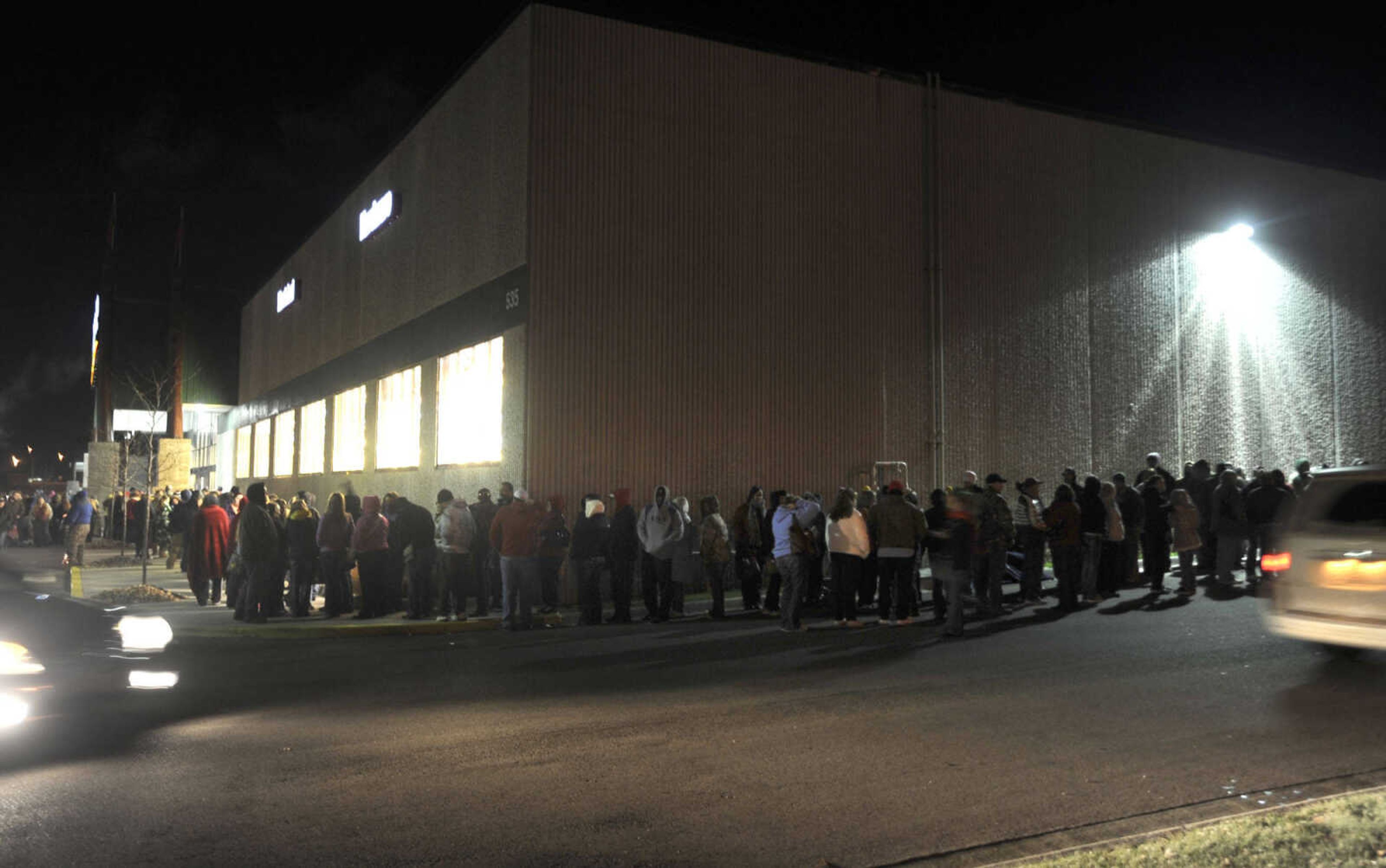 Shoppers wait in a line to begin Black Friday shopping at 6 a.m. at Menards in Cape Girardeau.