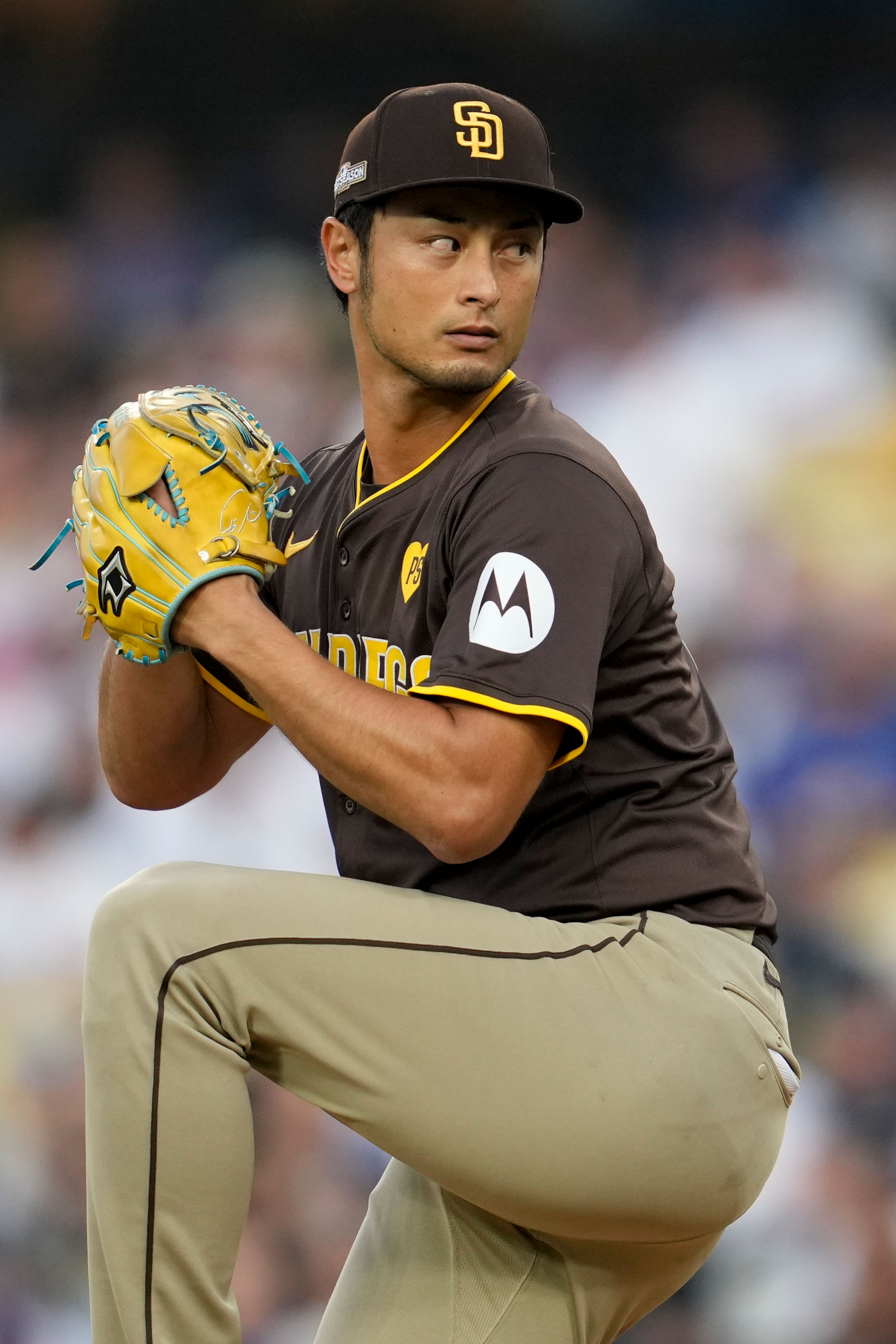 San Diego Padres starting pitcher Yu Darvish throws to a Los Angeles Dodgers batter during the third inning in Game 5 of a baseball NL Division Series Friday, Oct. 11, 2024, in Los Angeles. (AP Photo/Ashley Landis)