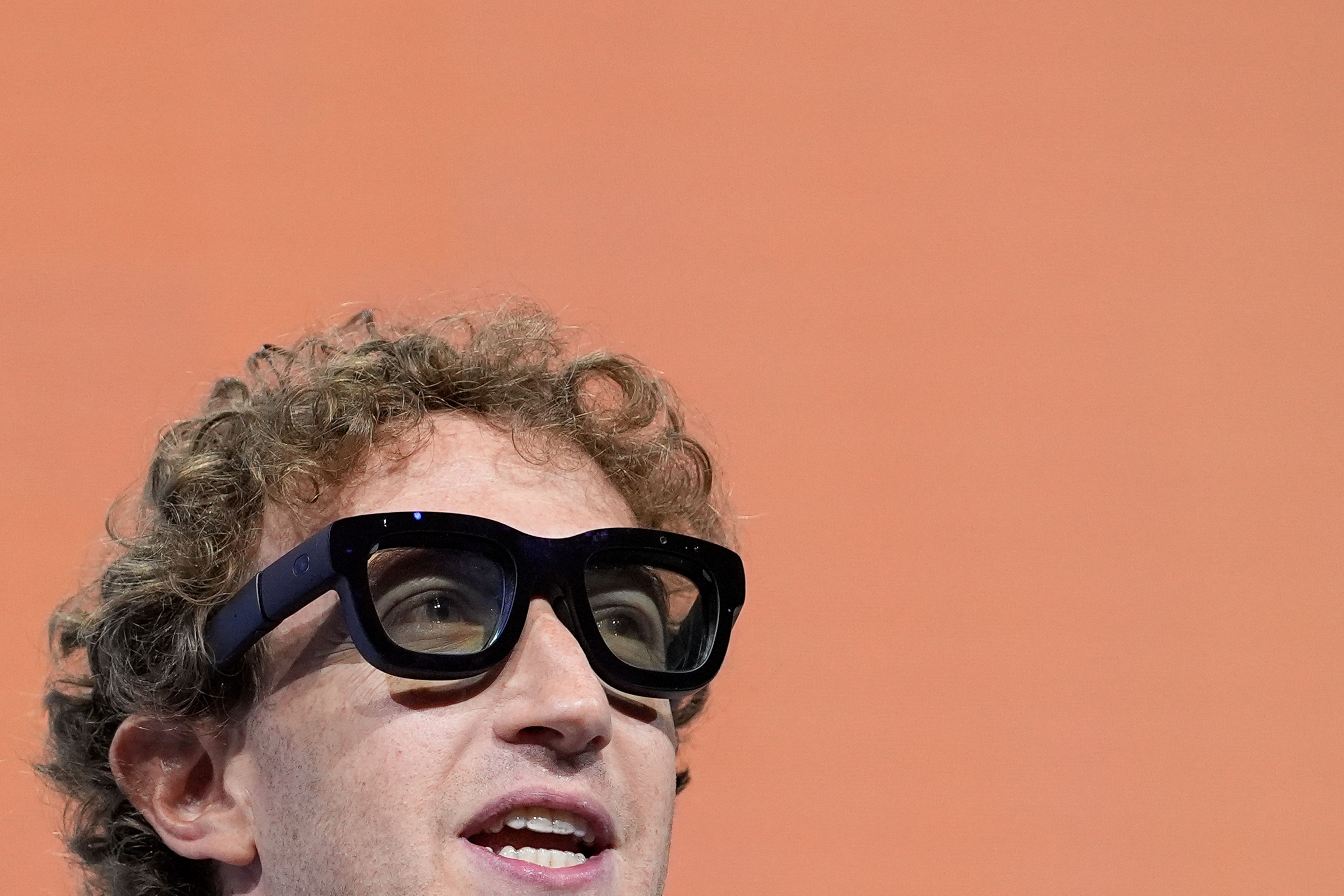 Mark Zuckerberg wears a pair of Orion AR glasses during the Meta Connect conference Wednesday, Sept. 25, 2024, in Menlo Park, Calif. (AP Photo/Godofredo A. Vásquez)