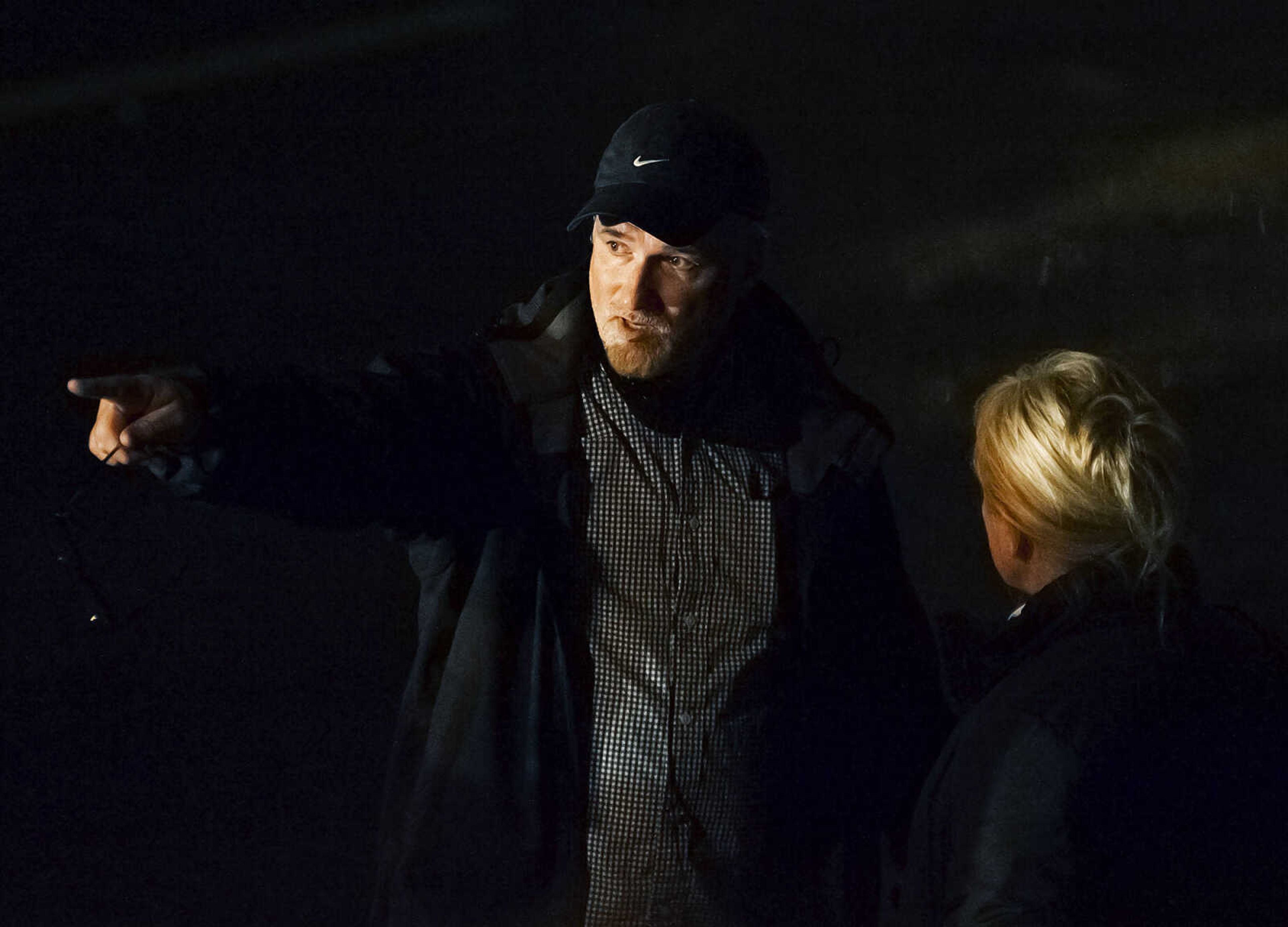 ADAM VOGLER ~ avogler@semissourian.com
Director David Fincher, left, speaks to a crew member while setting up to film a scene for the 20th Century Fox feature film "Gone Girl," Friday, Sept. 27, in downtown Cape Girardeau. Staring Ben Affleck and Rosamund Pike the film is expected to be filming in the Cape Girardeau area for several weeks.