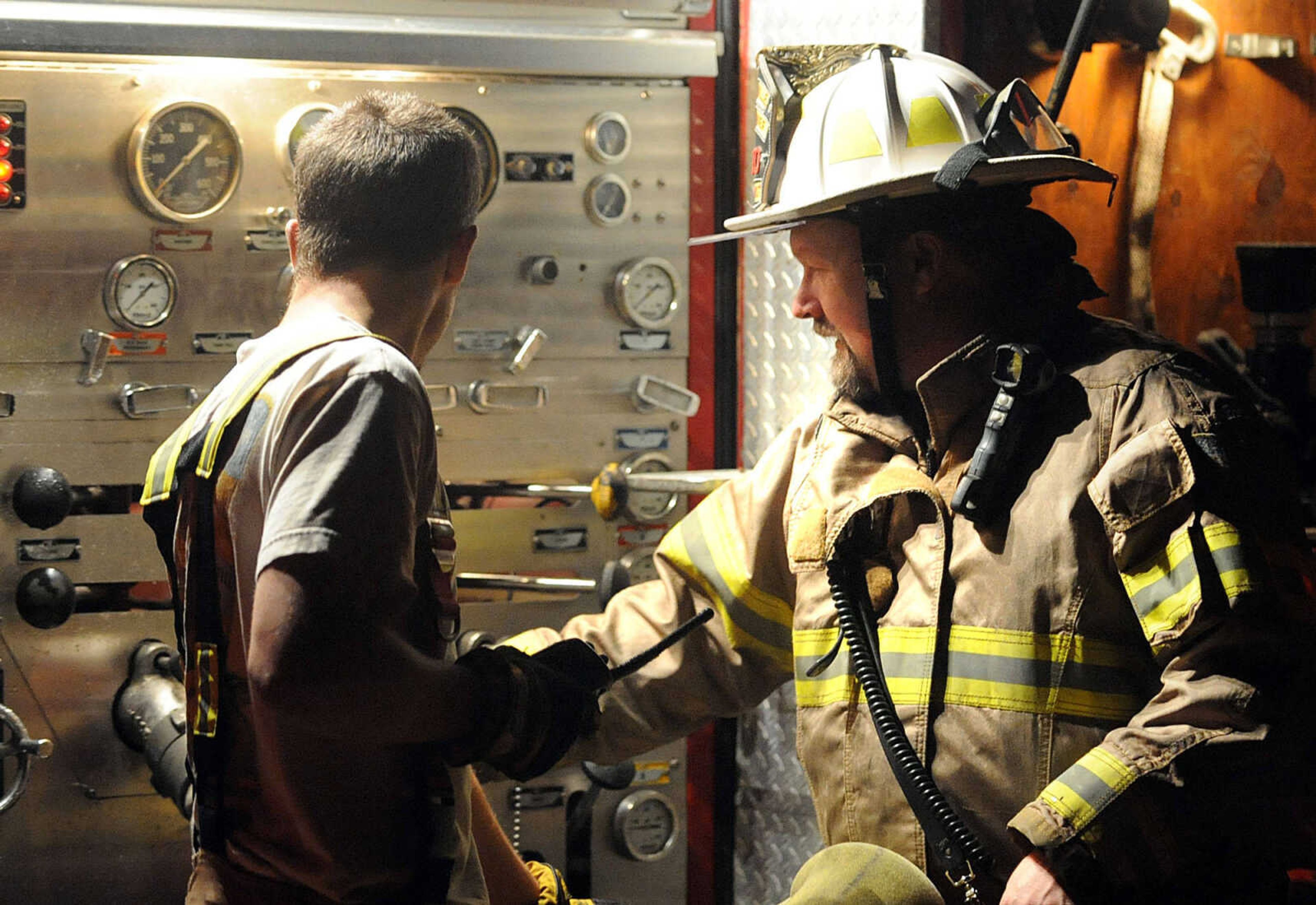 LAURA SIMON ~ lsimon@semissourian.com
Firefighters from Delta, Gordonville, Cape Girardeau, Millersville, Fruitland and East County Fire Departments battle a structure fire Wednesday night, January 9, 2012 on Onyx Lane in Cape Girardeau.