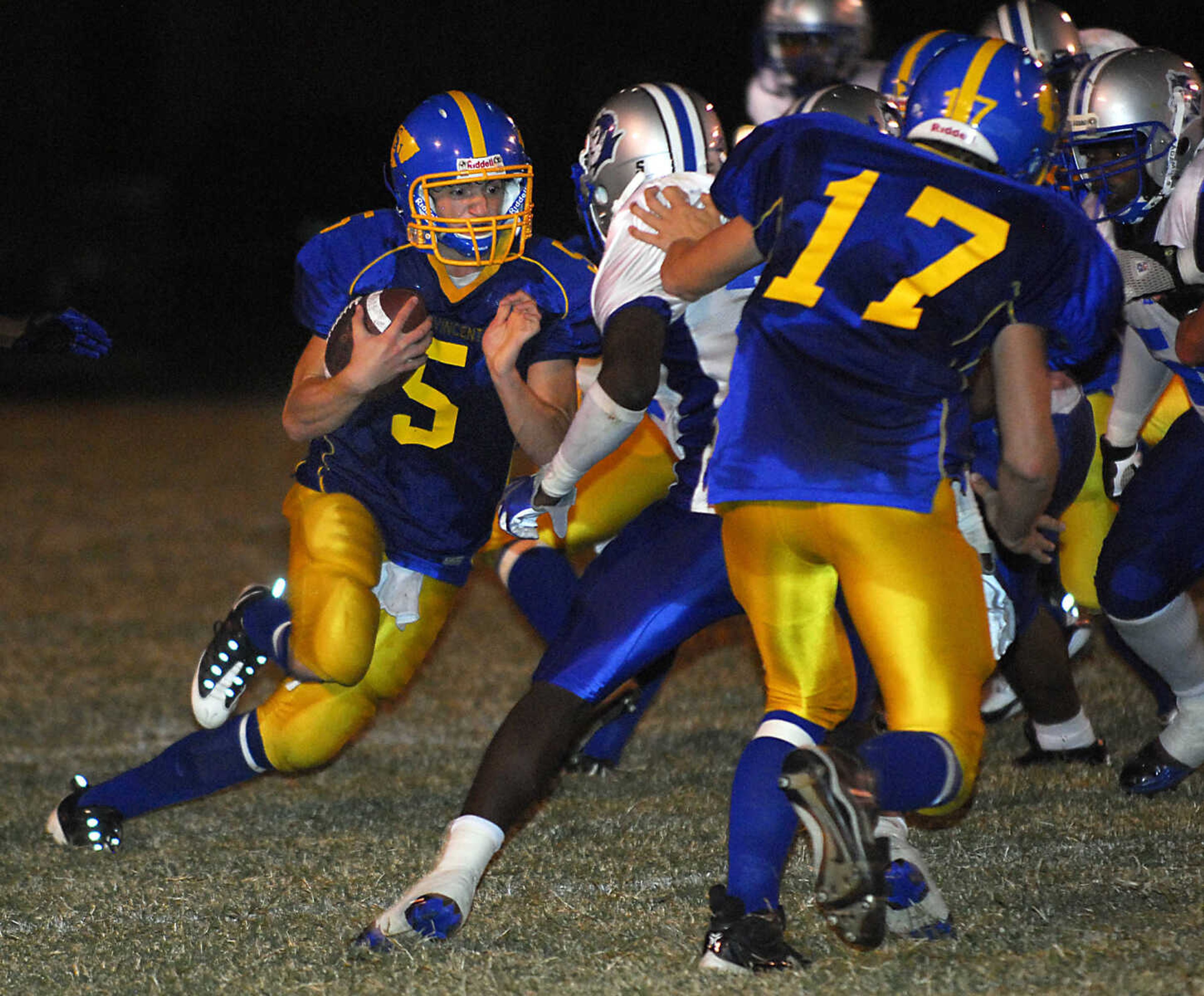 KIT DOYLE ~ kdoyle@semissourian.com
Indians quarterback Tim Schumer rushes Friday evening, September 18, 2009, in Perryville.  Schumer fumbled on the play.