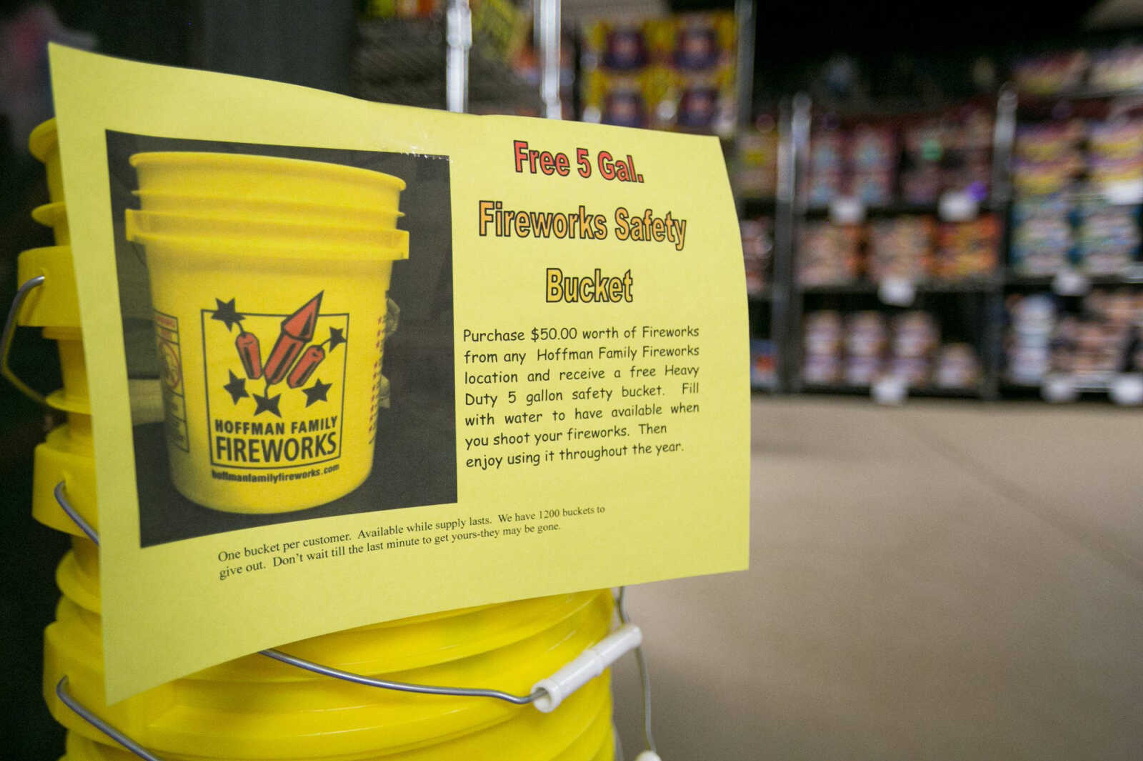 Five-gallon safety buckets sit on display at Hoffman Family Fireworks as part of a promotion Thursday in Scott City.