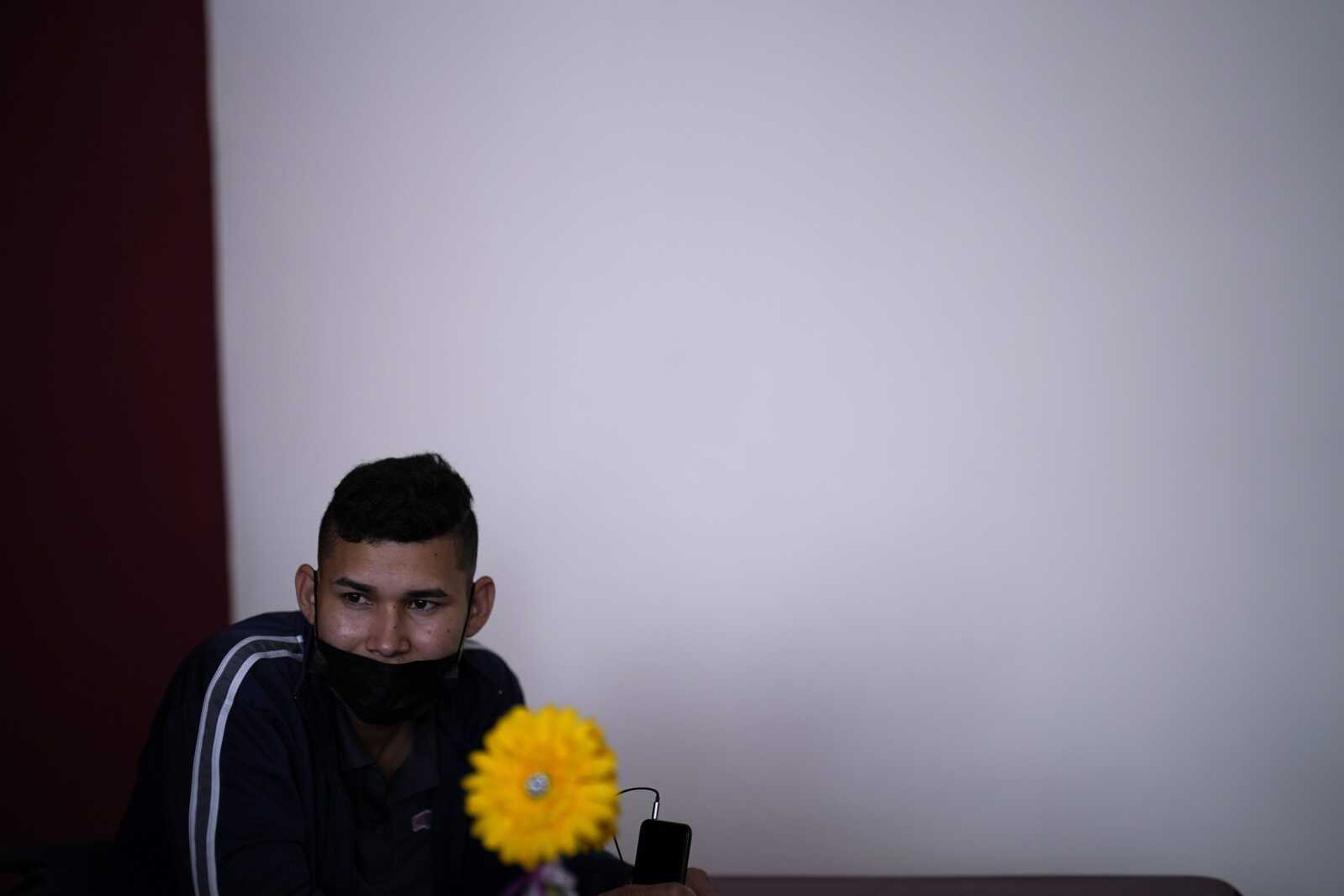 Emil Cardenas of Colombia waits at a shelter for migrants Thursday in Tijuana, Mexico. Cardenas, who was detained and sent back to Mexico after paying a smuggler to help him cross into the United States, hoped to live near his brother in New Jersey while seeking asylum but waits at the Tijuana shelter for his first hearing May 18 in San Diego.