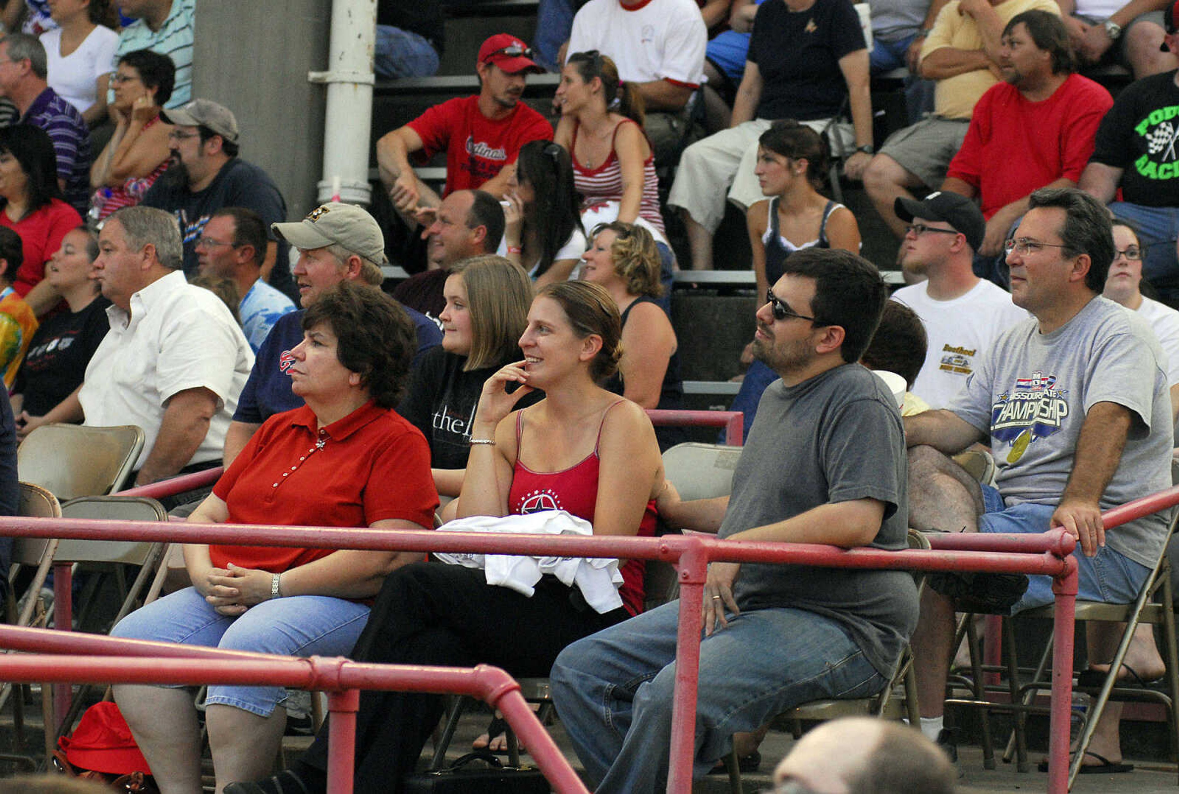 LAURA SIMON~lsimon@semissourian.com
The crowd in the grandstand watches the Dual Demolition Derby during the U.S.A. Veterans Fourth of July celebration at Arena Park in Cape Girardeau Sunday, July 4, 2010.