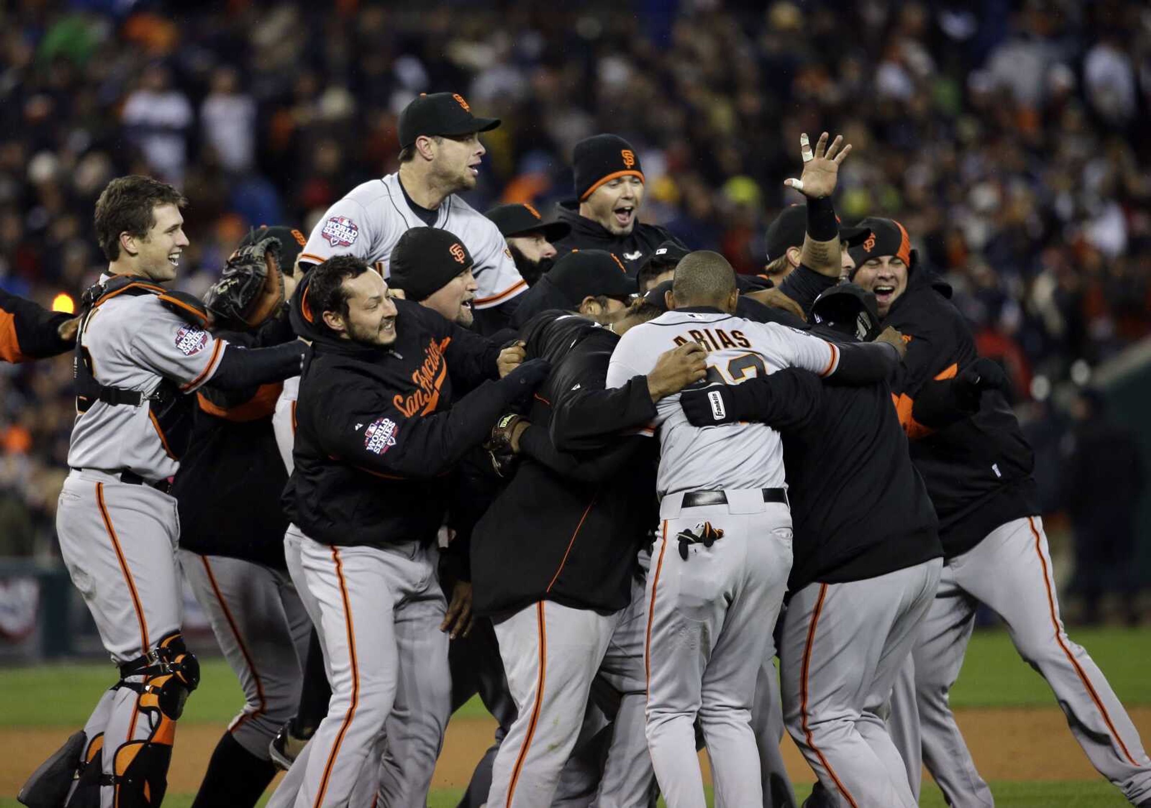 Giants players celebrate after winning Game 4 of the World Series against the Tigers on Sunday in Detroit. The Giants won 4-3. (David J. Phillip ~ Associated Press)