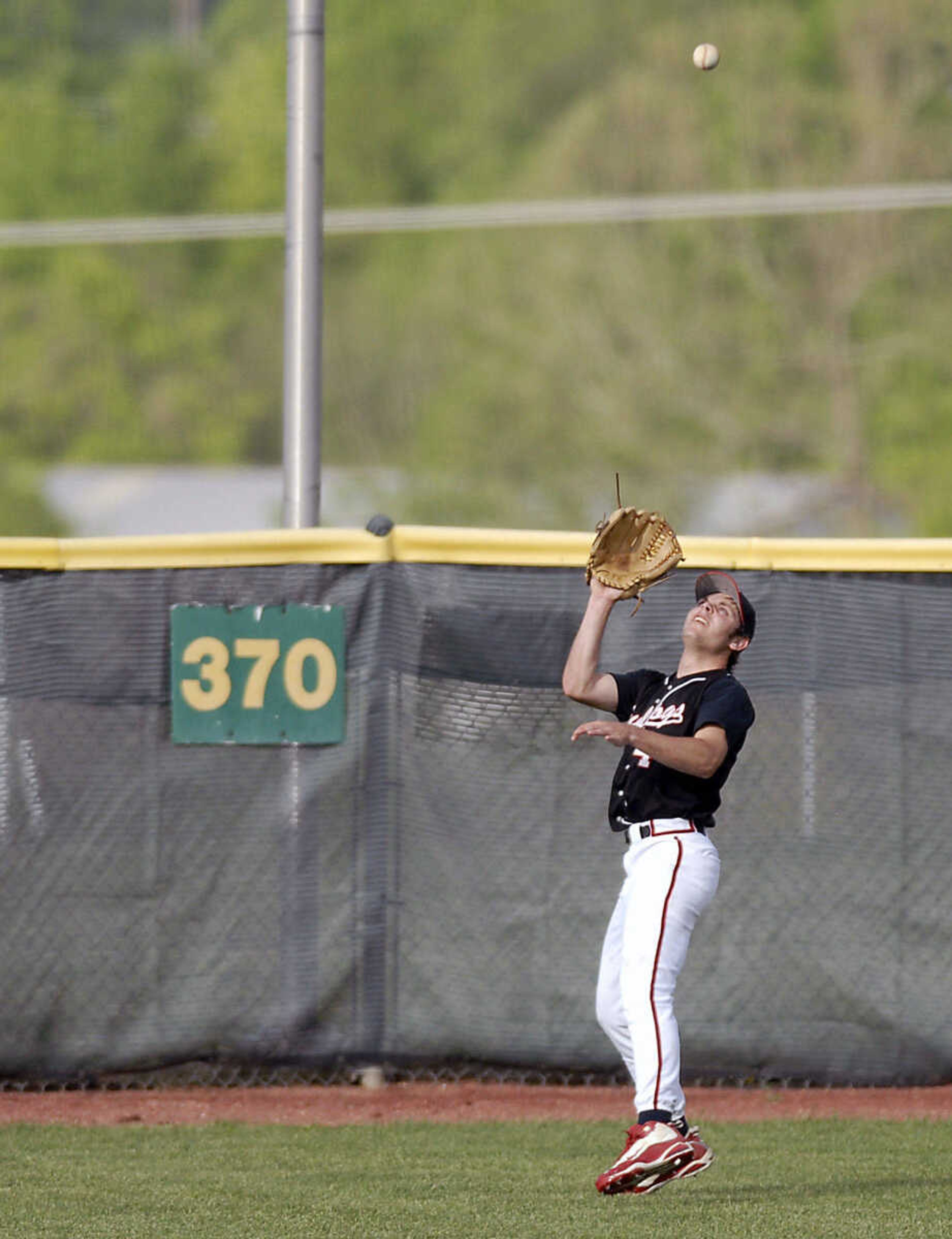 Sikeston center fielder Charlie Bohannon pulls in a long fly ball Tuesday, April 28, 2009, against Notre Dame in Cape Girardeau.