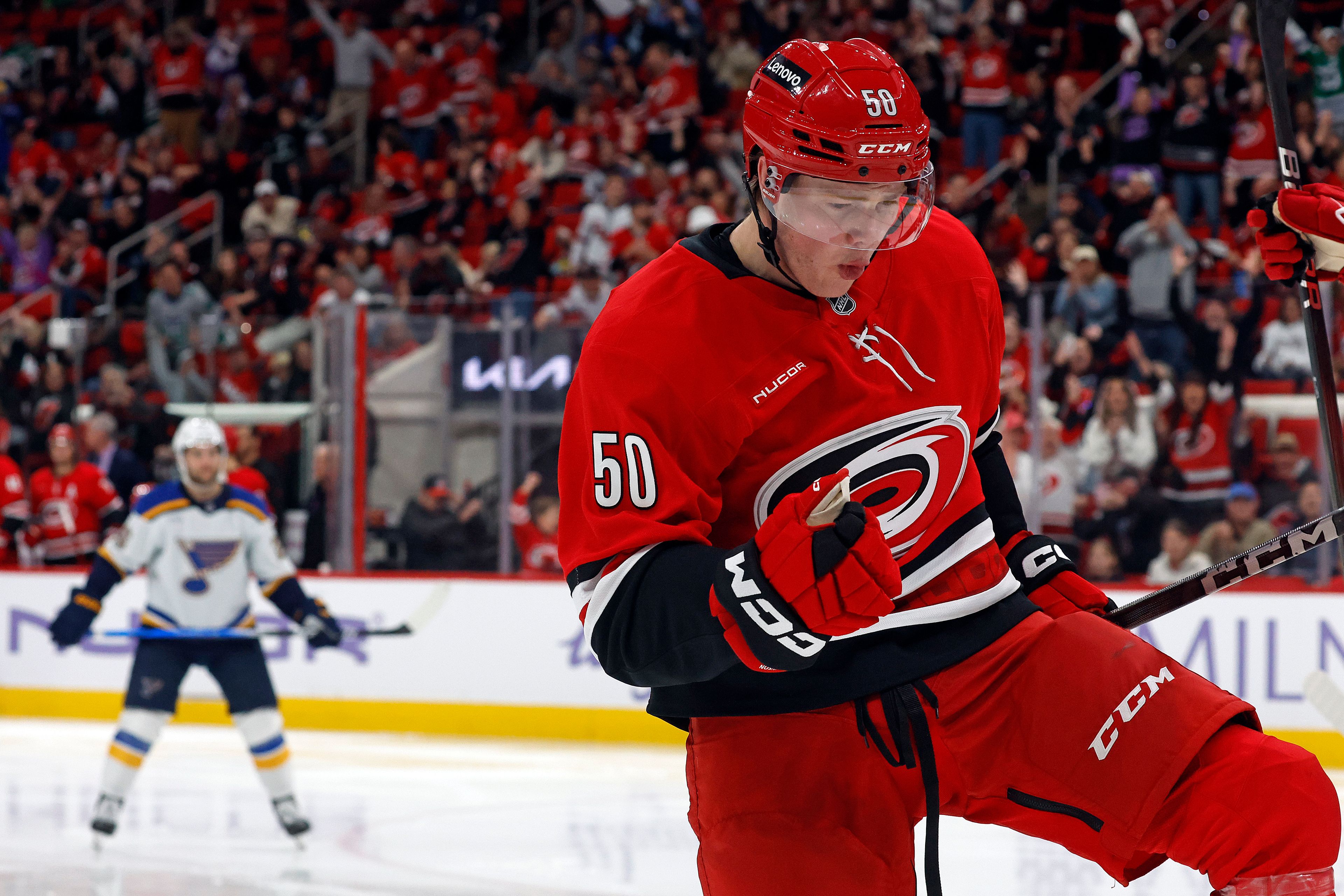 Carolina Hurricanes' Eric Robinson (50) celebrates his goal against the St. Louis Blues during the second period of an NHL hockey game in Raleigh, N.C., Sunday, Nov. 17, 2024. (AP Photo/Karl B DeBlaker)