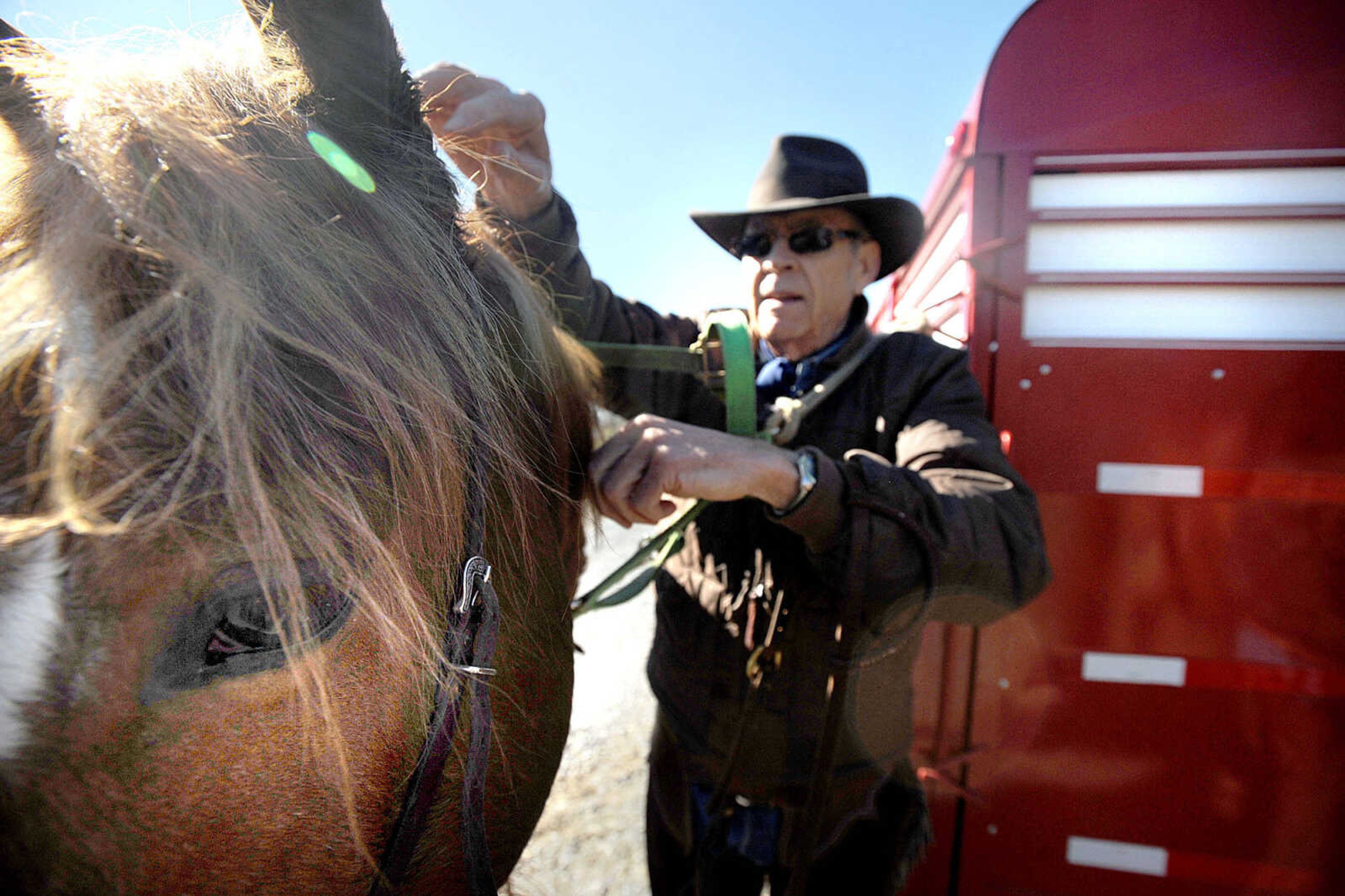 LAURA SIMON ~ lsimon@semissourian.com
John Johnson of Sikeston prepares to ride Knute on the horse trail at the Missouri Department of Conservation's Apple Creek Conservation Area Wednesday afternoon, Feb. 6, 2013. Johnson and his fellow rider Randy Jackson of Leachville, Ark. ride the Apple Creek trail several times a year.