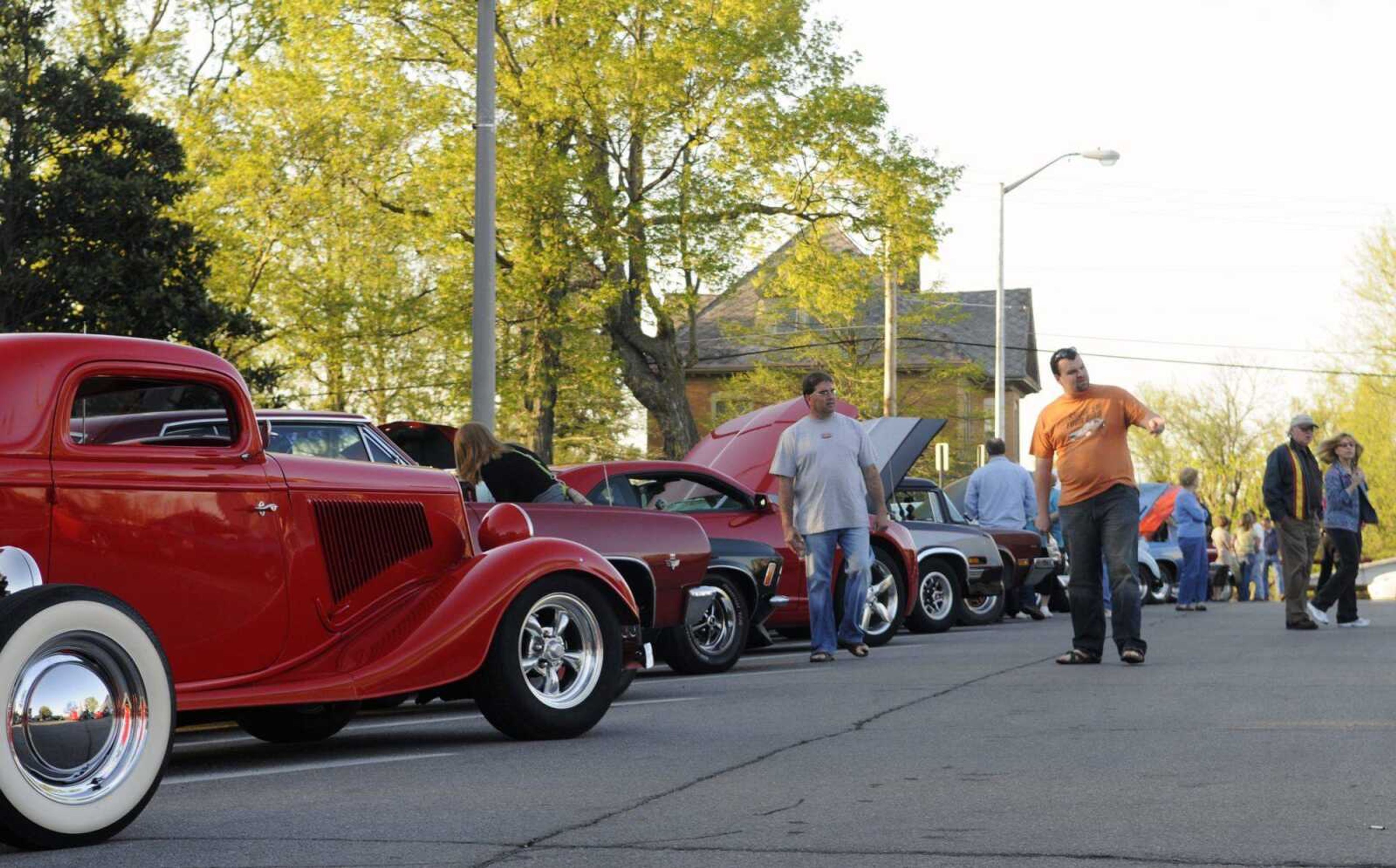 An array of cars, trucks and motorcycles line the street outside the courthouse Saturday during the first Cruisin' Uptown Jackson car show presented by the Jackson Community Outreach and hosted by the River City Rodders in Jackson. (KRISTIN EBERTS)