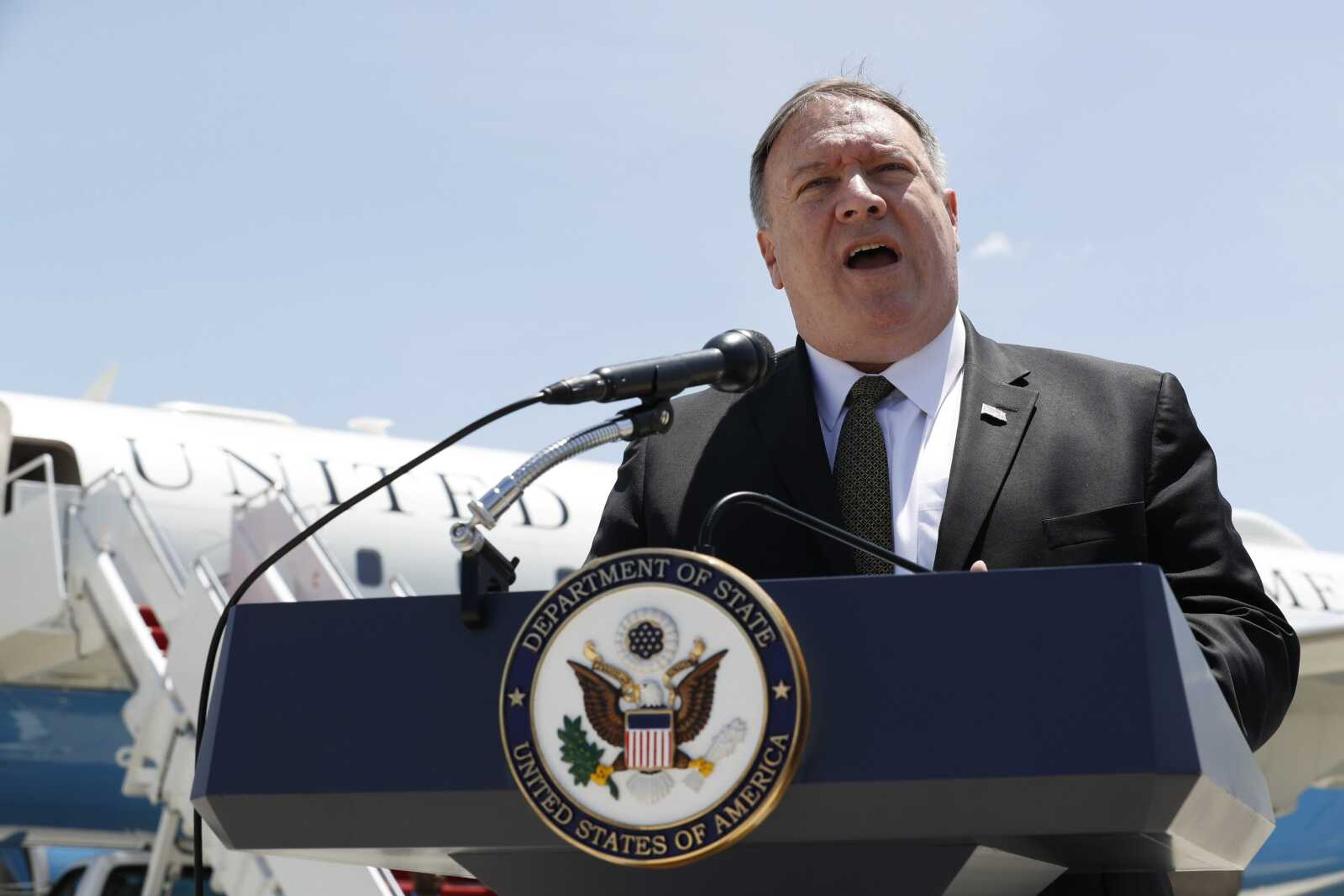 Secretary of State Mike Pompeo speaks to the media Sunday at Andrews Air Force Base, Maryland, before boarding a plane headed to Jeddah, Saudi Arabia.