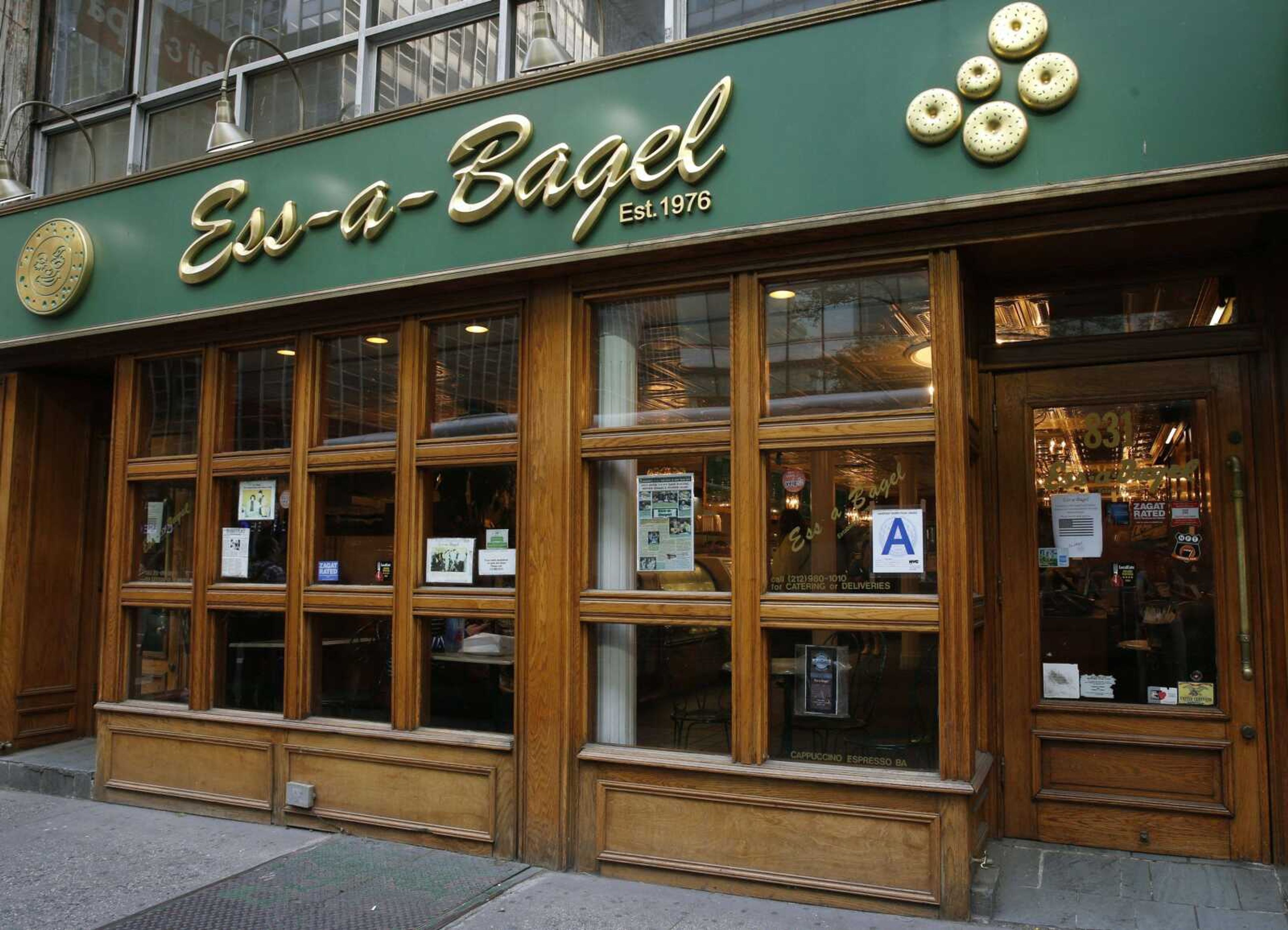 This Thursday, May 26, photo shows the exterior of Ess-a-Bagel on Third Avenue and 51st Street in New York. The business has been around for nearly 40 years, but has moved to Midtown, though the old shop, located on First Avenue at 1st street, will be reopening near the original location soon, said Melanie Frost, the company's chief operating officer. (AP Photo/Kathy Willens)