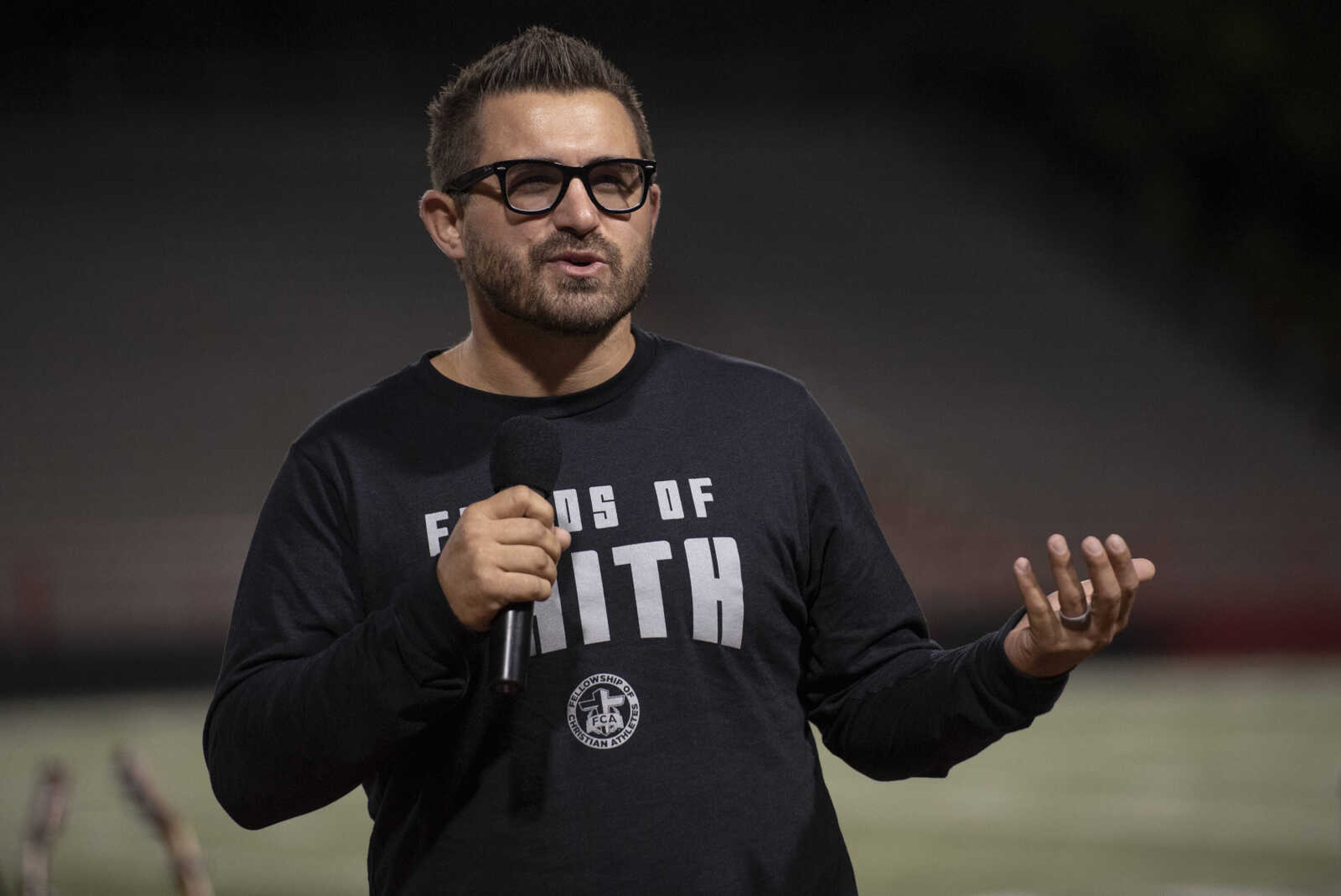 Keynote speaker and former Southeast fullback Nick Grassi of Jackson delivers a gospel message during the Fields of Faith event at Houck Stadium in Cape Girardeau on Wednesday, Oct. 14, 2020.