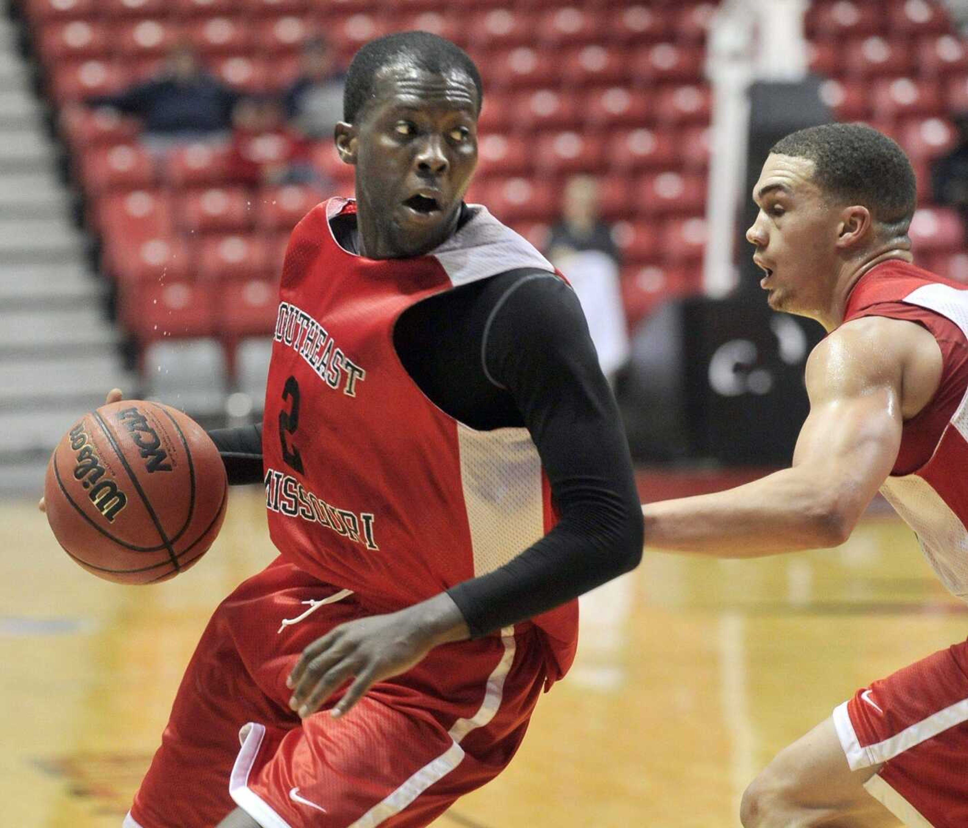 A.J. Jones drives against Jared White during the Southeast men&#8217;s basketball scrimmage Saturday at the Show Me Center. (Fred Lynch)