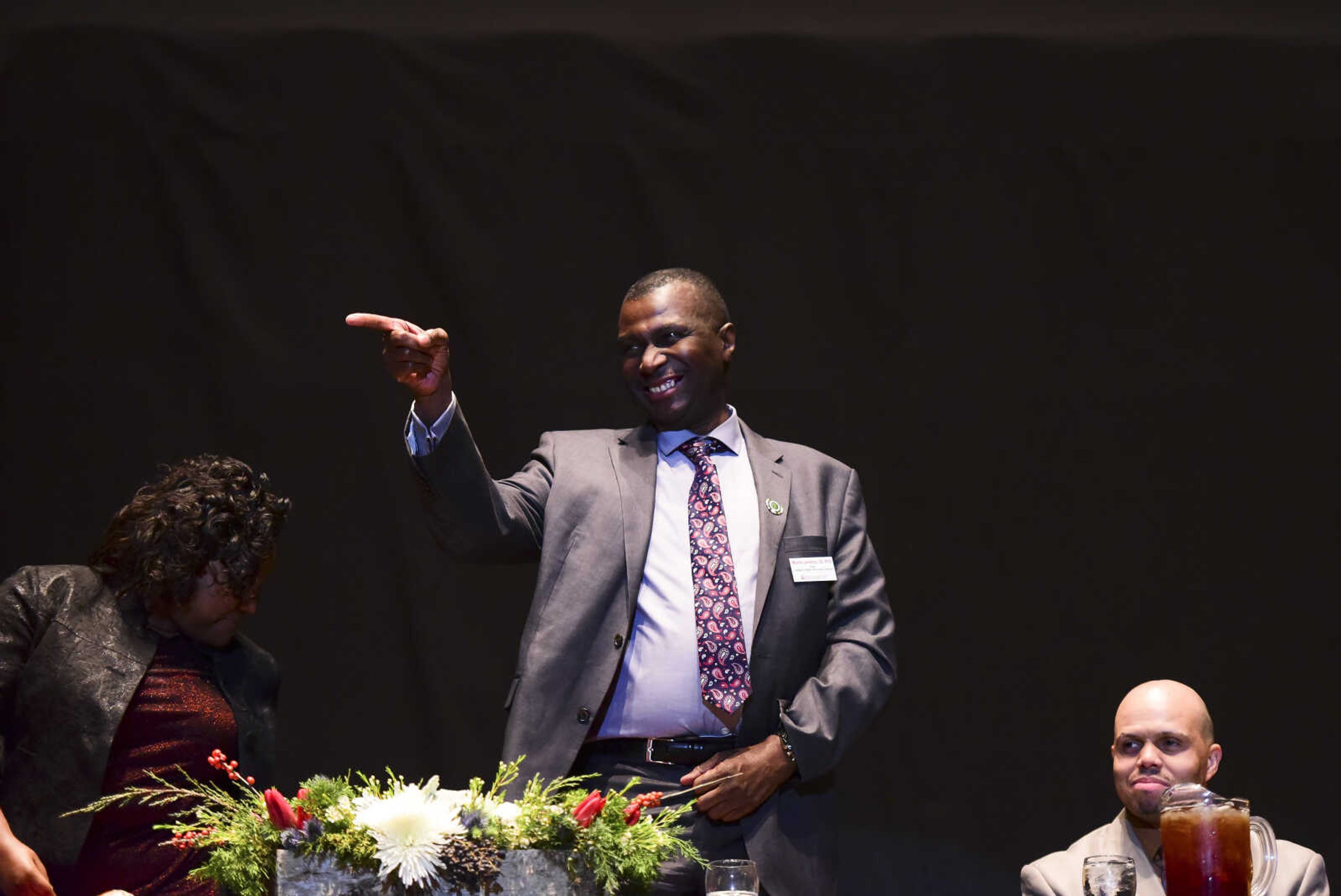 Dr. Morris Jenkins, College of Health and Human Services, points out to the audience during the Dr. Martin Luther King, Jr. Celebration Dinner Wednesday, Jan. 18, 2017 at the Show Me Center in Cape Girardeau.