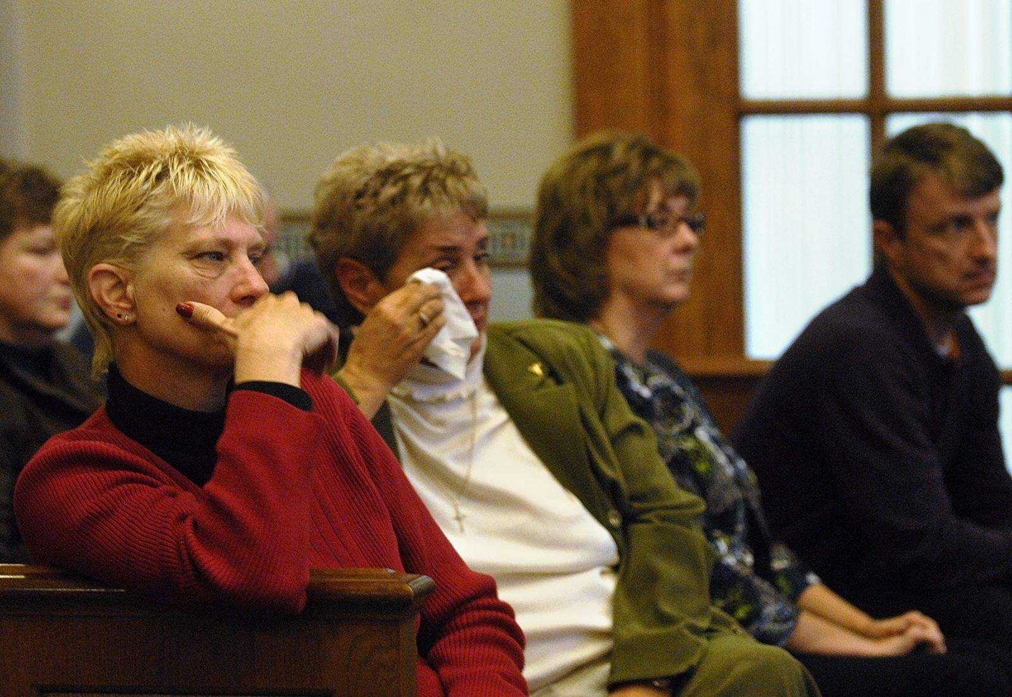 ELIZABETH DODD ~ edodd@semissourian.com
Aunts of Joshua C. Kezer, Janice Allott, left, and Margie Widhalm tear up while listening to Kezer testify in a hearing alleging wrongful conviction at the Cole County Courthouse in Jefferson City Wednesday.