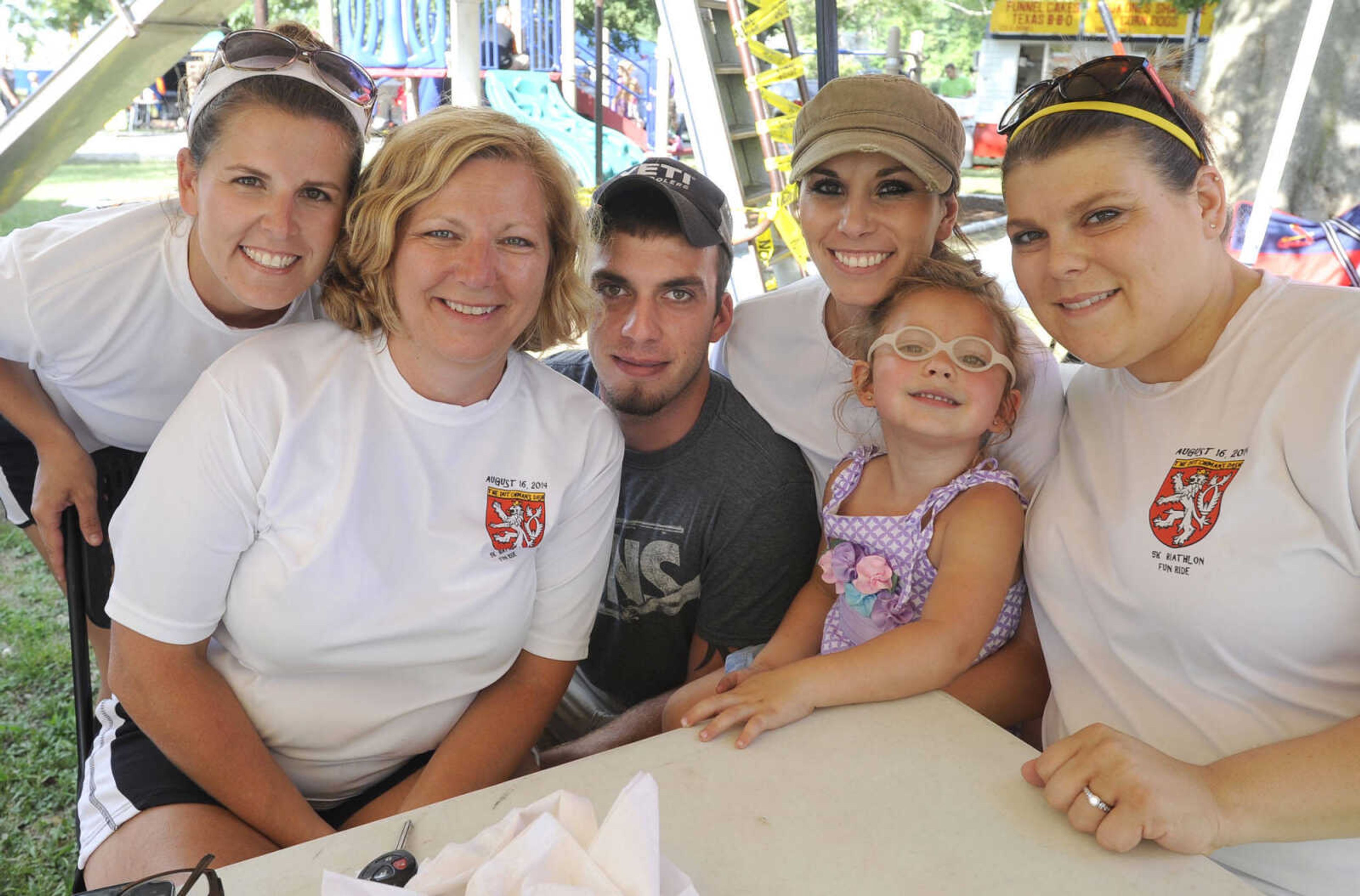 Morgan Swinford, left, Brenda Miller, Gabe Miller, Mallory Dohogne, Lisa Dohogne and Tara Lincoln with the Dutchman's Dash 5K Biathlon Fun Run pose for a photo at German Days on Saturday, Aug. 9, 2014 at Frisco Park in Chaffee, Missouri.