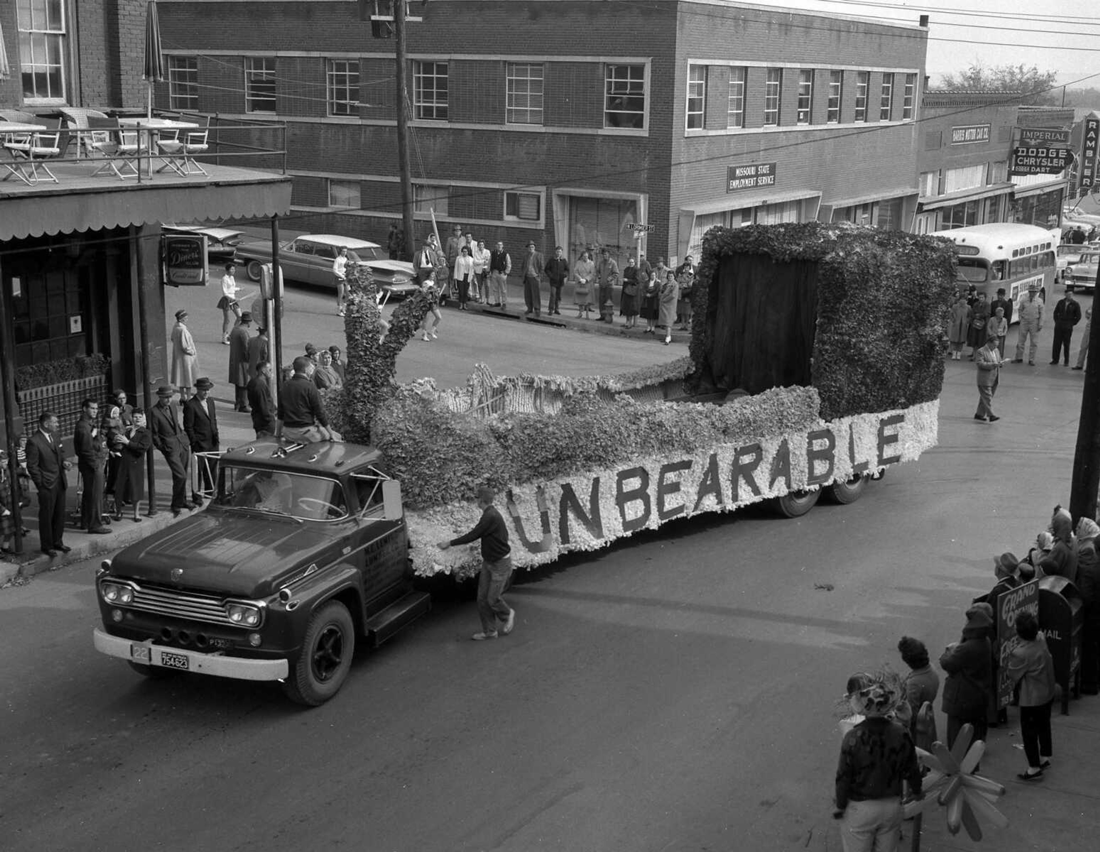 A State College Homecoming parade tops Broadway hill in this undated photograph.