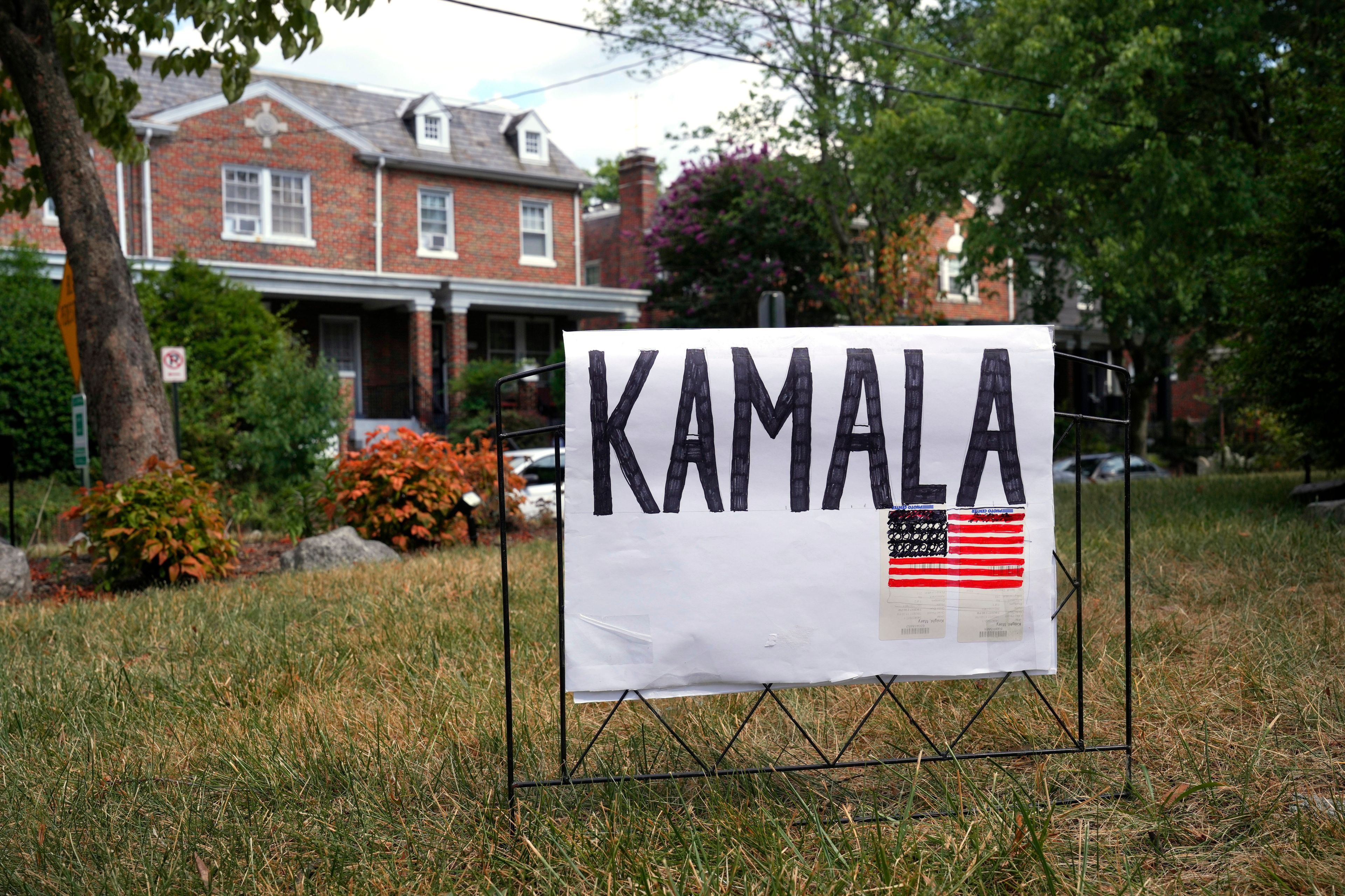 A handmade sign for Vice President Kamala Harris appears on a lawn, Sunday, July 21, 2024, in Washington. She’s already broken barriers, and now Harris could soon become the first Black woman to head a major party's presidential ticket after President Joe Biden’s ended his reelection bid. The 59-year-old Harris was endorsed by Biden on Sunday, after he stepped aside amid widespread concerns about the viability of his candidacy. (AP Photo/Jacquelyn Martin)