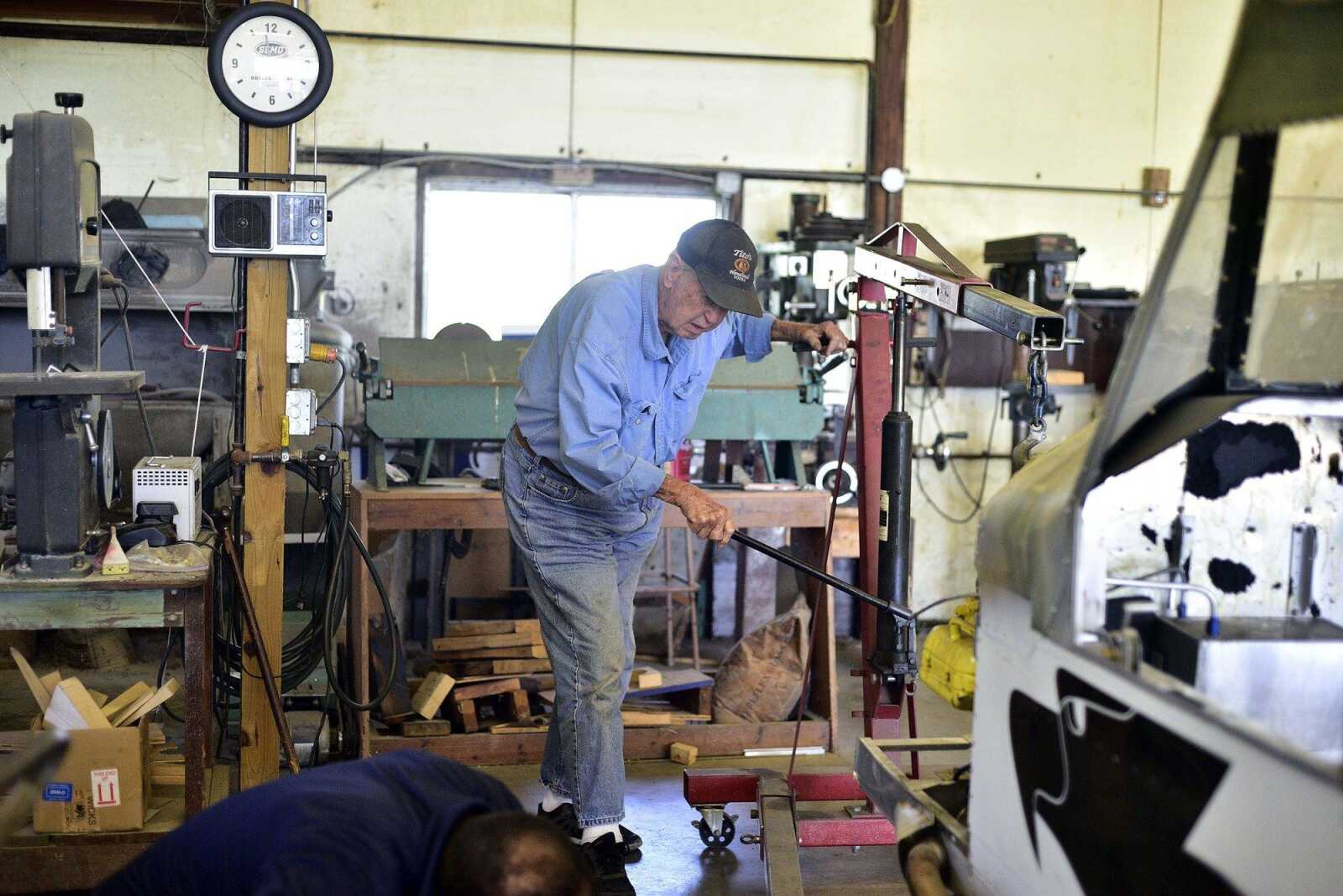 John Farquhar, or known to most as "Papa John" spends most of his days tinkering inside the hangar that houses Cape Copters at the Cape Girardeau Regional Airport.