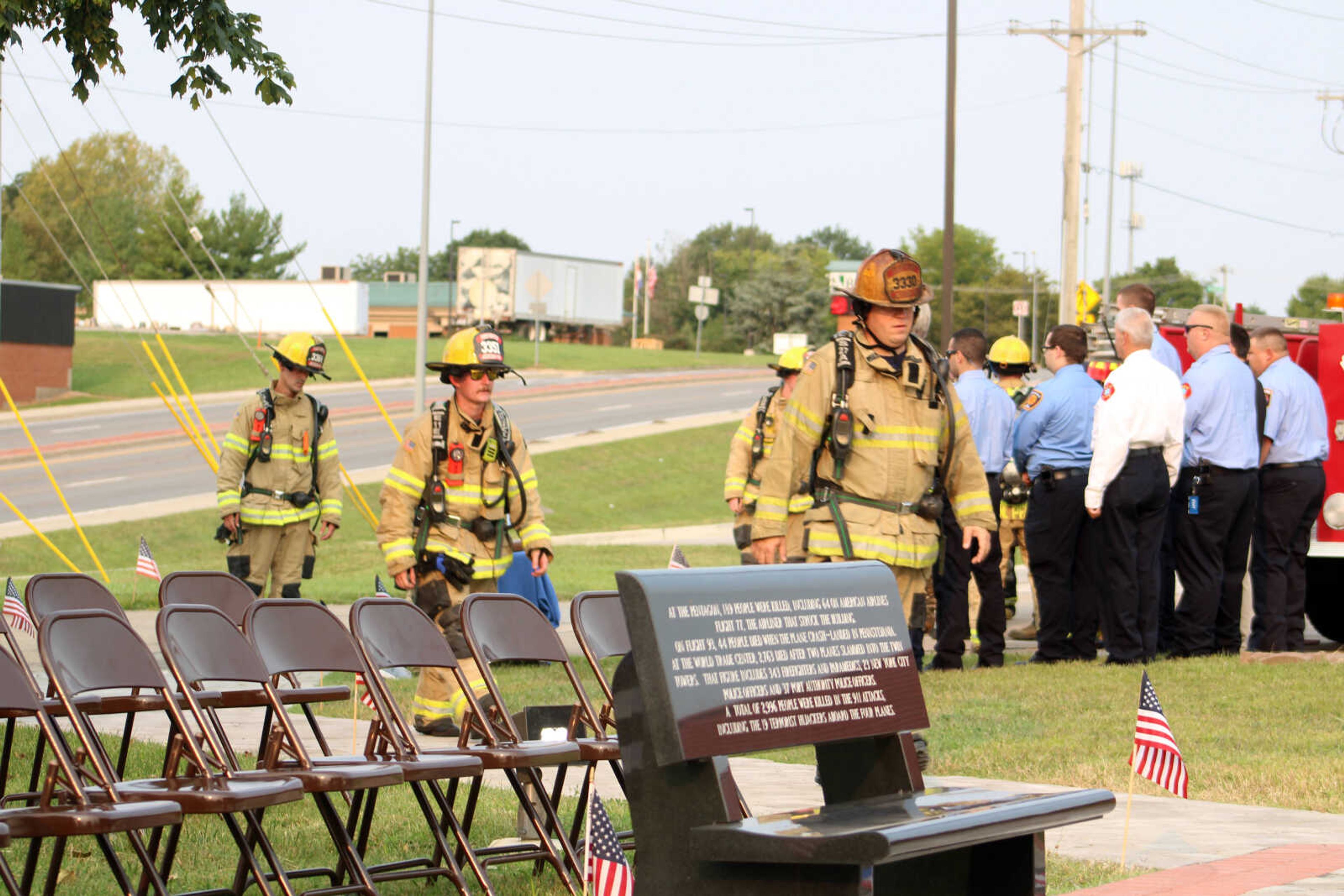 Members of the Jackson Fire Rescue walk 3.43 miles to Fire Station 1 from Kohlfeld Distributing in Jackson Saturday, Sept. 11, 2021, to honor those who died in the terrorist attacks 20 years ago.