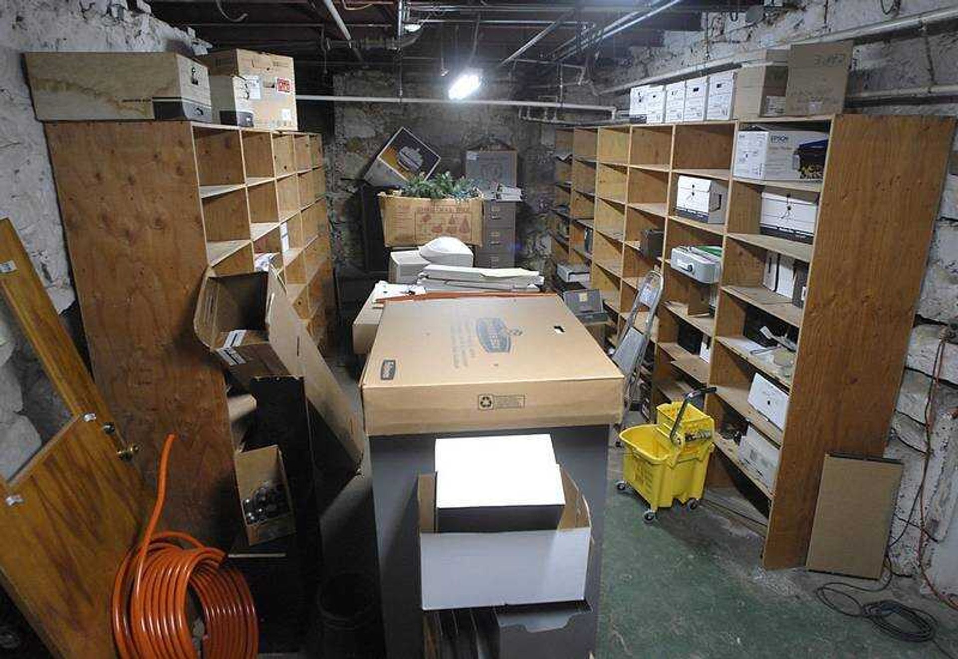 FRED LYNCH ~ flynch@semissourian.com
Many of the boxes that once sat in these shelves in the Common Pleas Courthouse have been moved to storage in Jackson. Water seeping into this room has made the environment of the courthouse's basement a poor one in which to keep court documents.