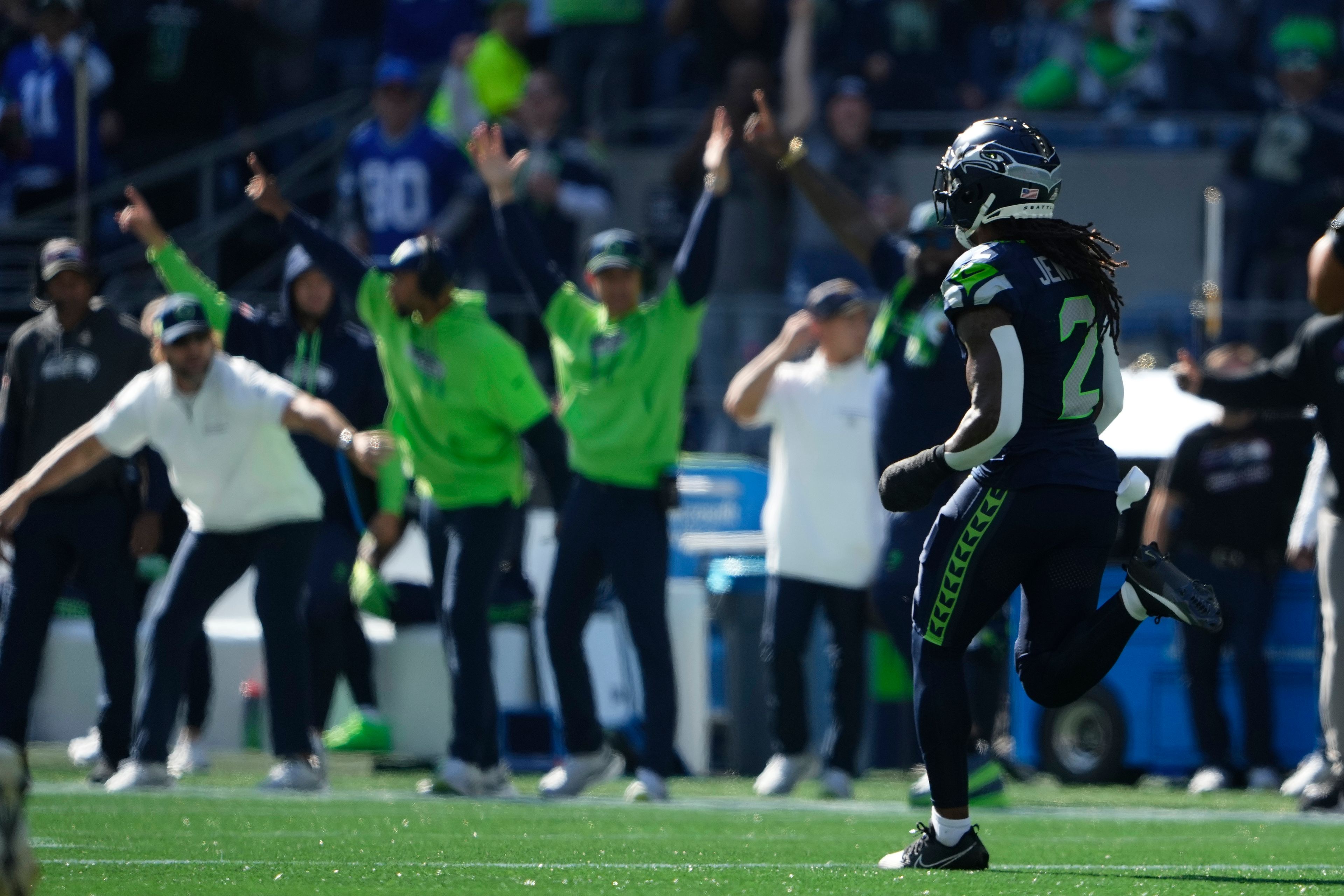 Seattle Seahawks safety Rayshawn Jenkins (2) runs for a 102-yard touchdown after recovering a fumble during the first half of an NFL football game agains the New York Giants, Sunday, Oct. 6, 2024, in Seattle. (AP Photo/Lindsey Wasson)