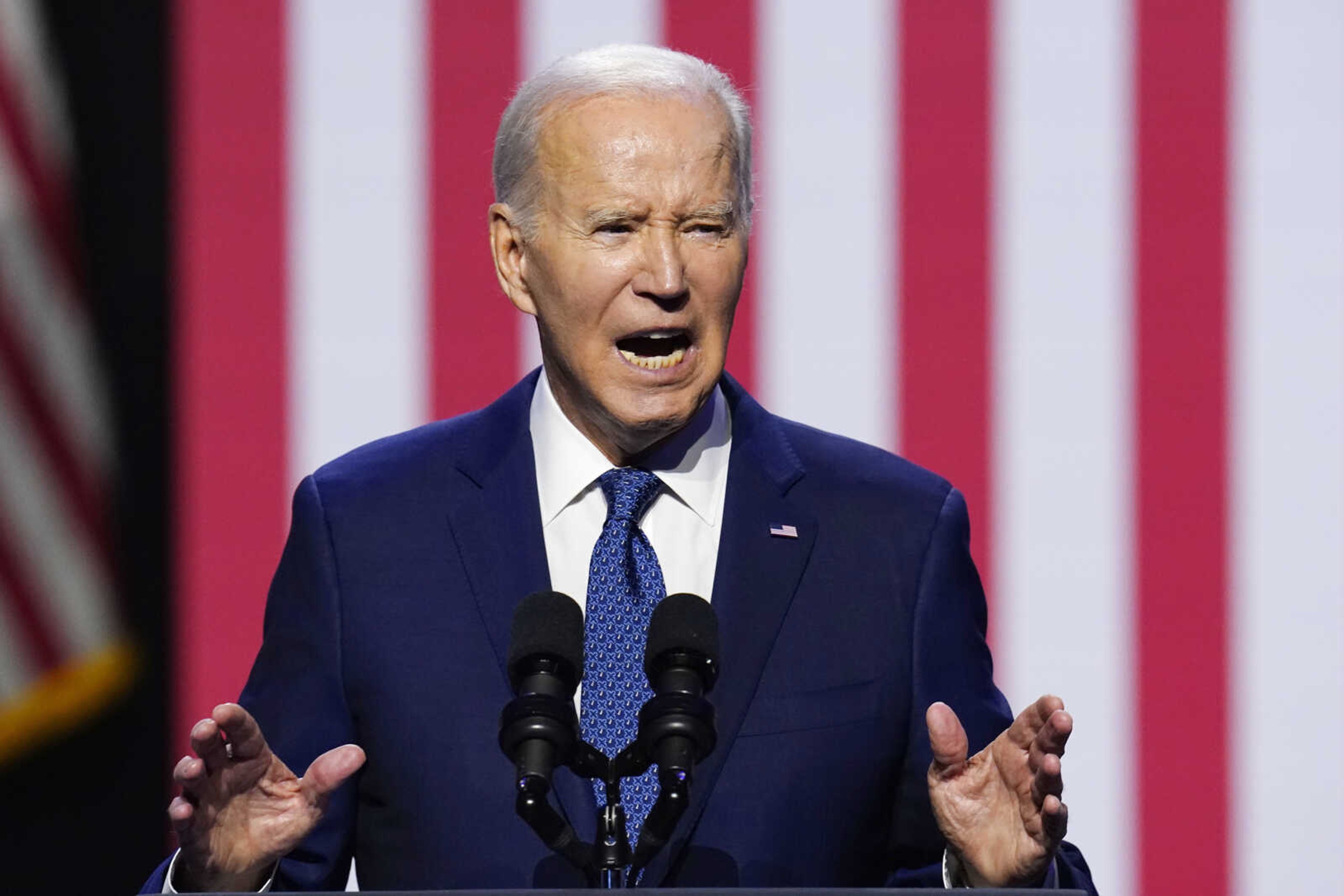 President Joe Biden speaks about democracy and the legacy of Arizona Republican Sen. John McCain at the Tempe Center for the Arts, Thursday in Tempe, Arizona.