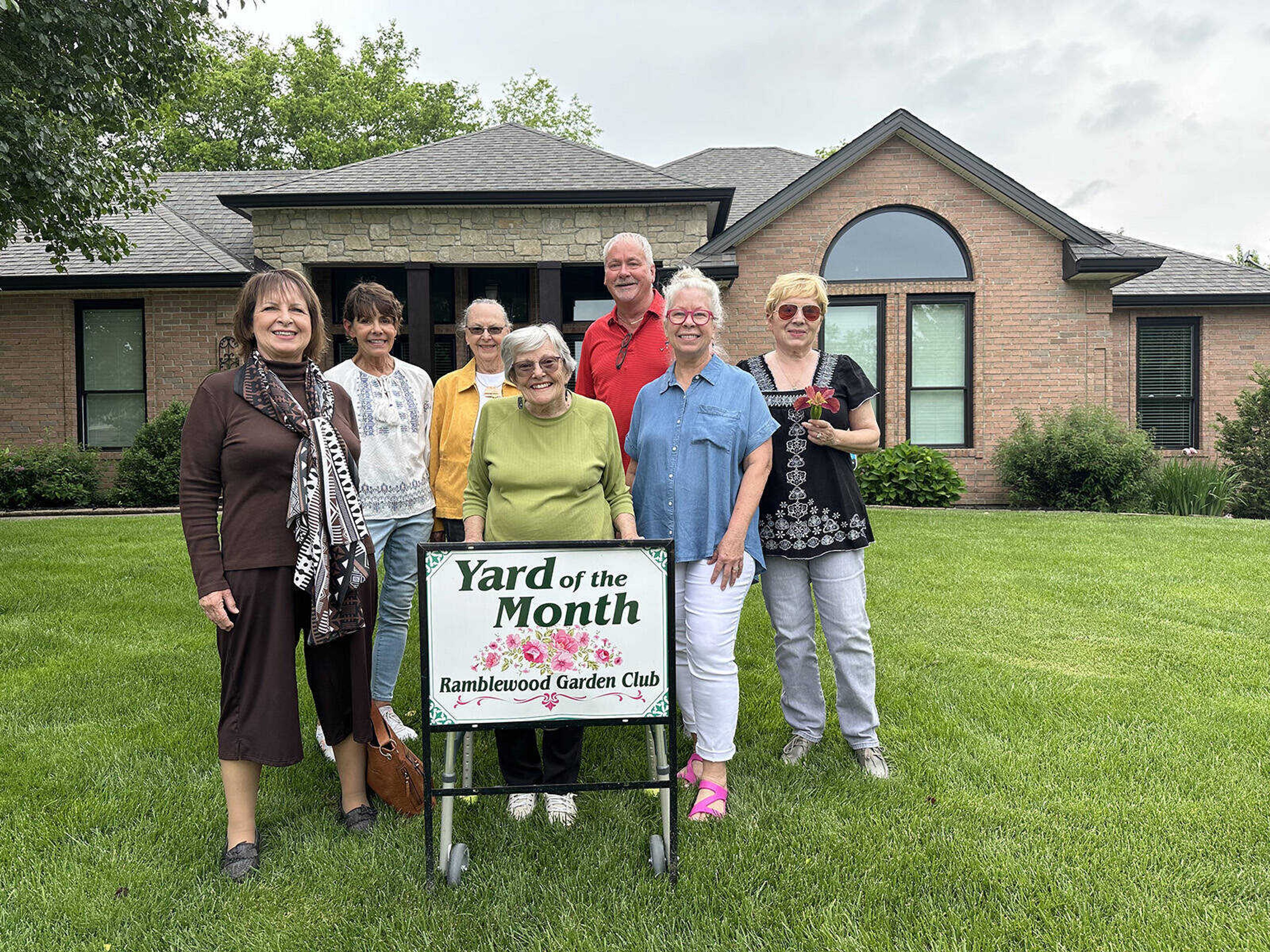 Pictured are garden club members Elaine Lannom, Julie McDonald, Anne Foust, Nadine Davis, homeowners Chris and Laurel Adkisson and Gabriele Eckart.