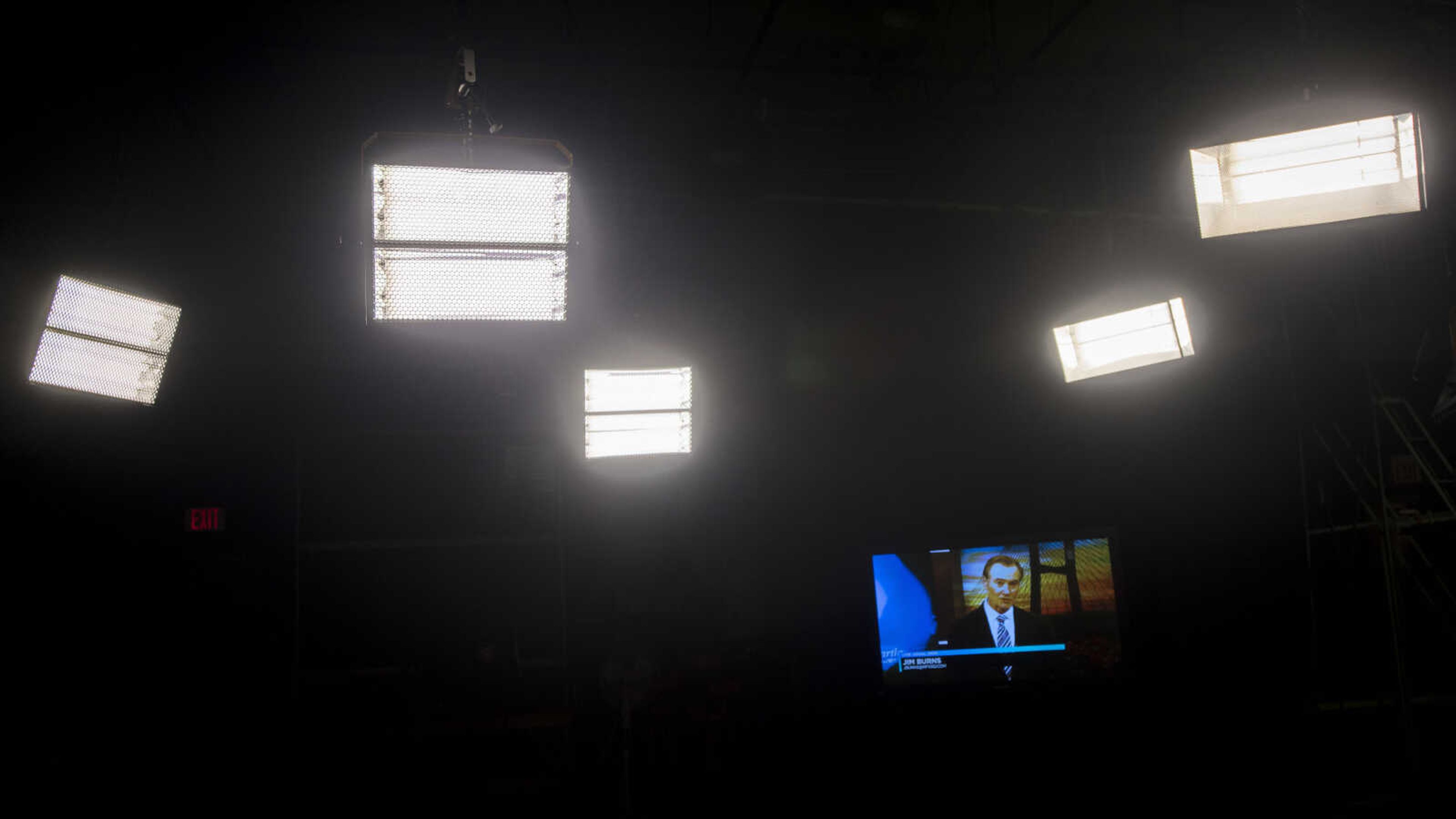 Anchor Jim Burns is seen in a monitor under studio lighting at the KFVS news desk during his final morning show before retirement Friday, Dec. 21, 2018.