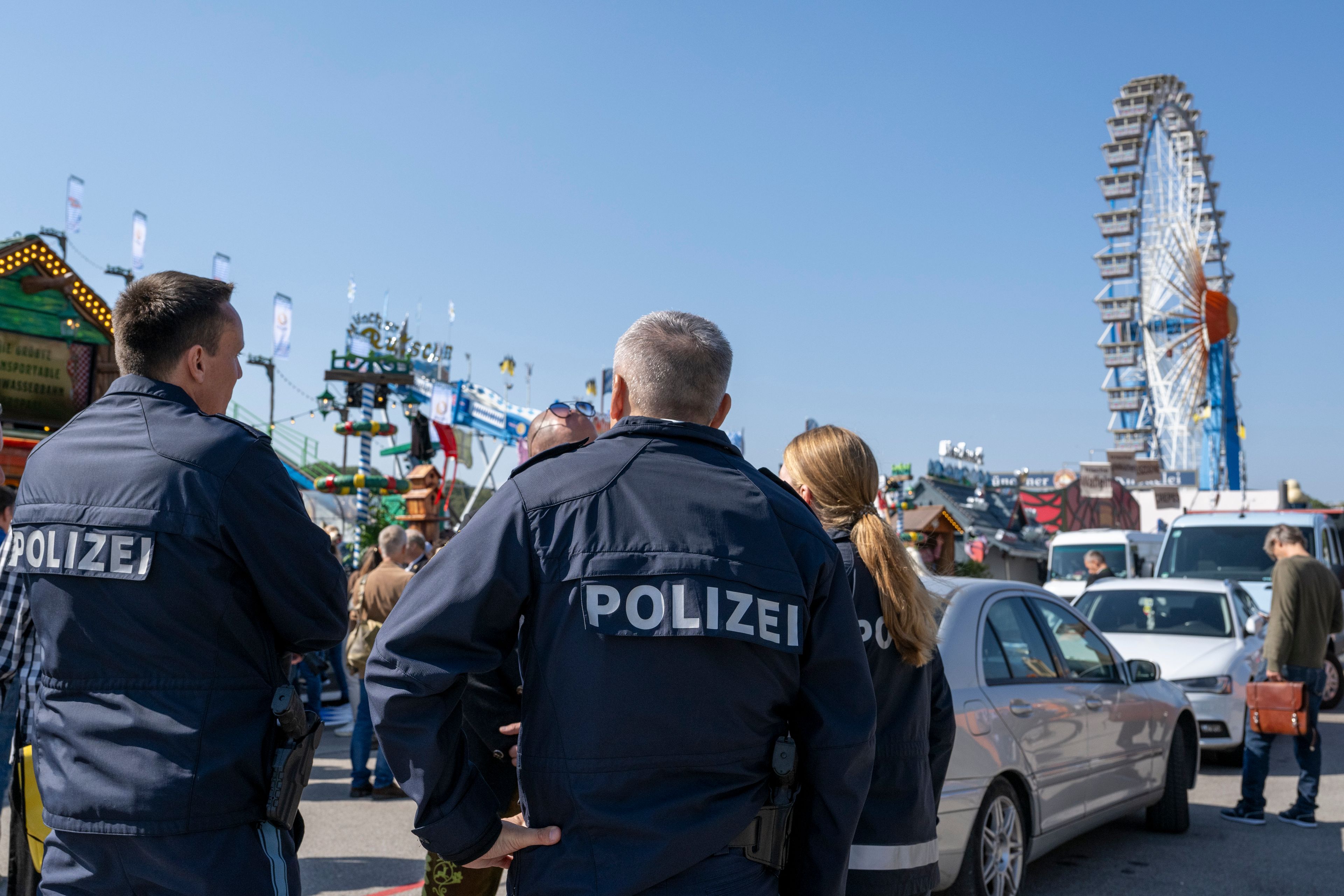 Police officer patrol, during a press tour at the Oktoberfest, in Munich, Germany, Thursday, Sept. 19, 2024. (Lennart Preiss/dpa via AP)