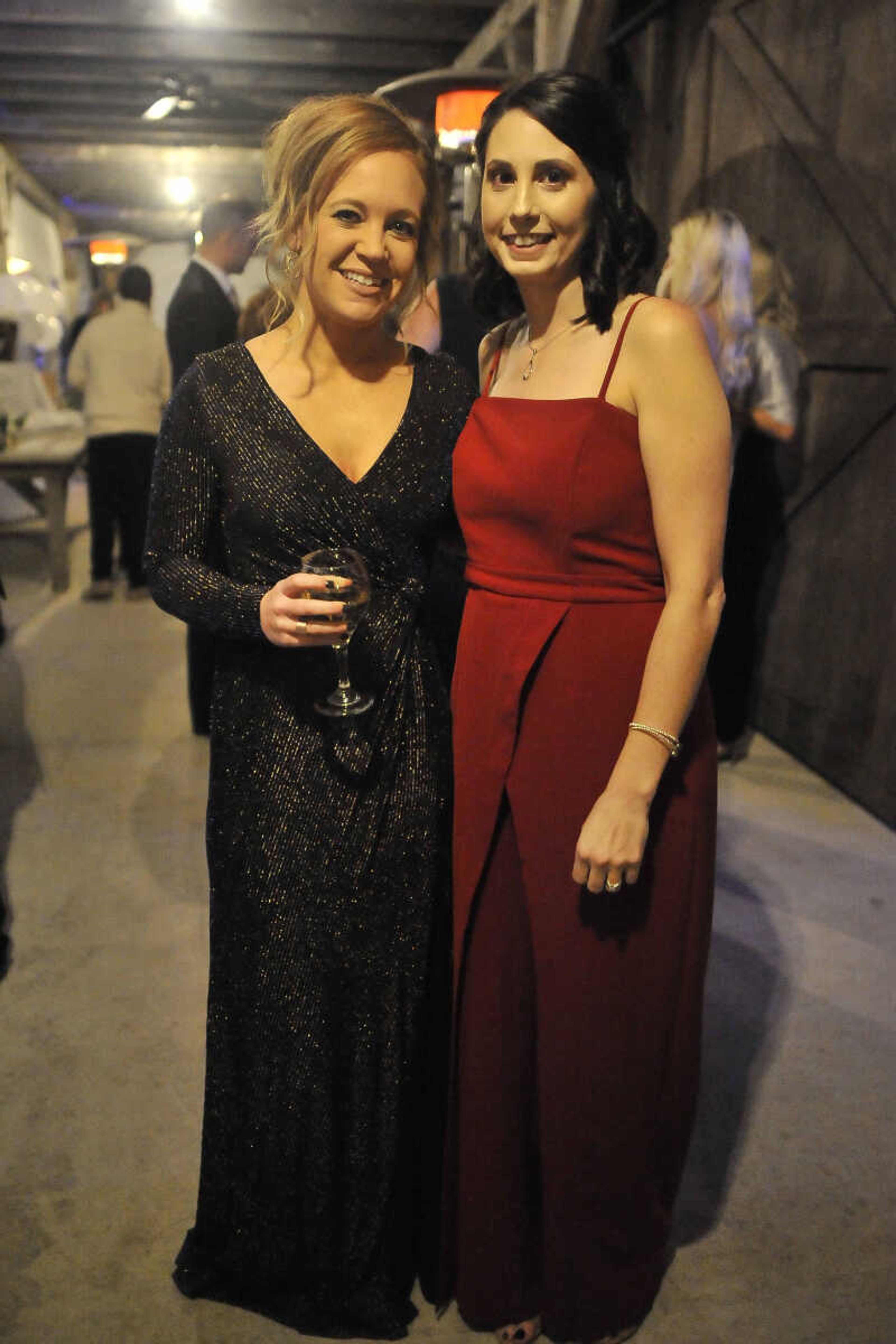 Kelly Lakenburger and Sasha Williams pose for a photo during a fundraising gala for the American Cancer Society at Rusted Route Farms Saturday, Nov. 16, 2019, in Cape Girardeau.