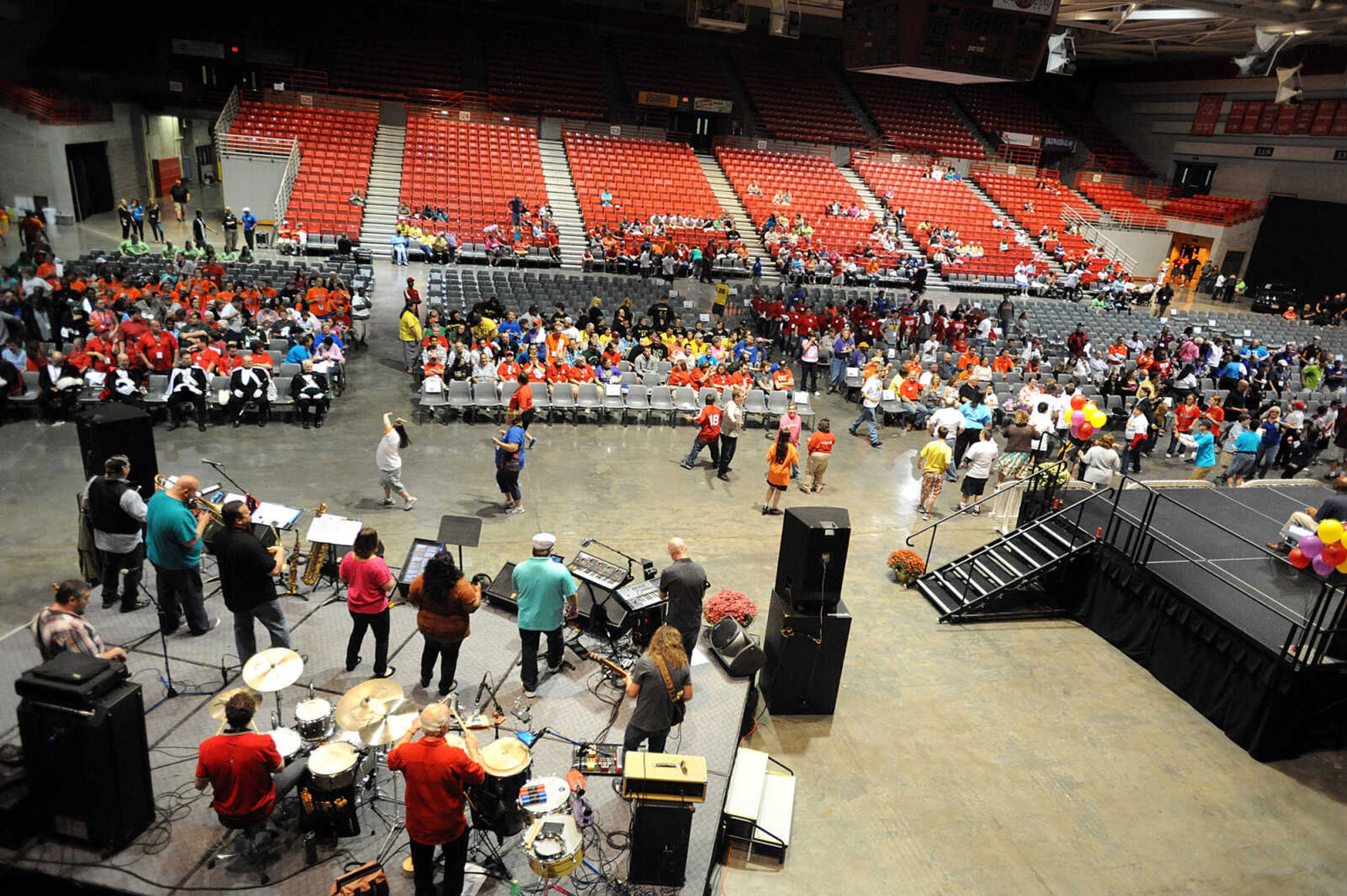 LAURA SIMON ~ lsimon@semissourian.com

Special Olympic athletes dance to music from Shades of Soul, Friday, Oct. 11, 2013 during the opening ceremony for the Special Olympics Missouri State Fall Games at the Show Me Center.