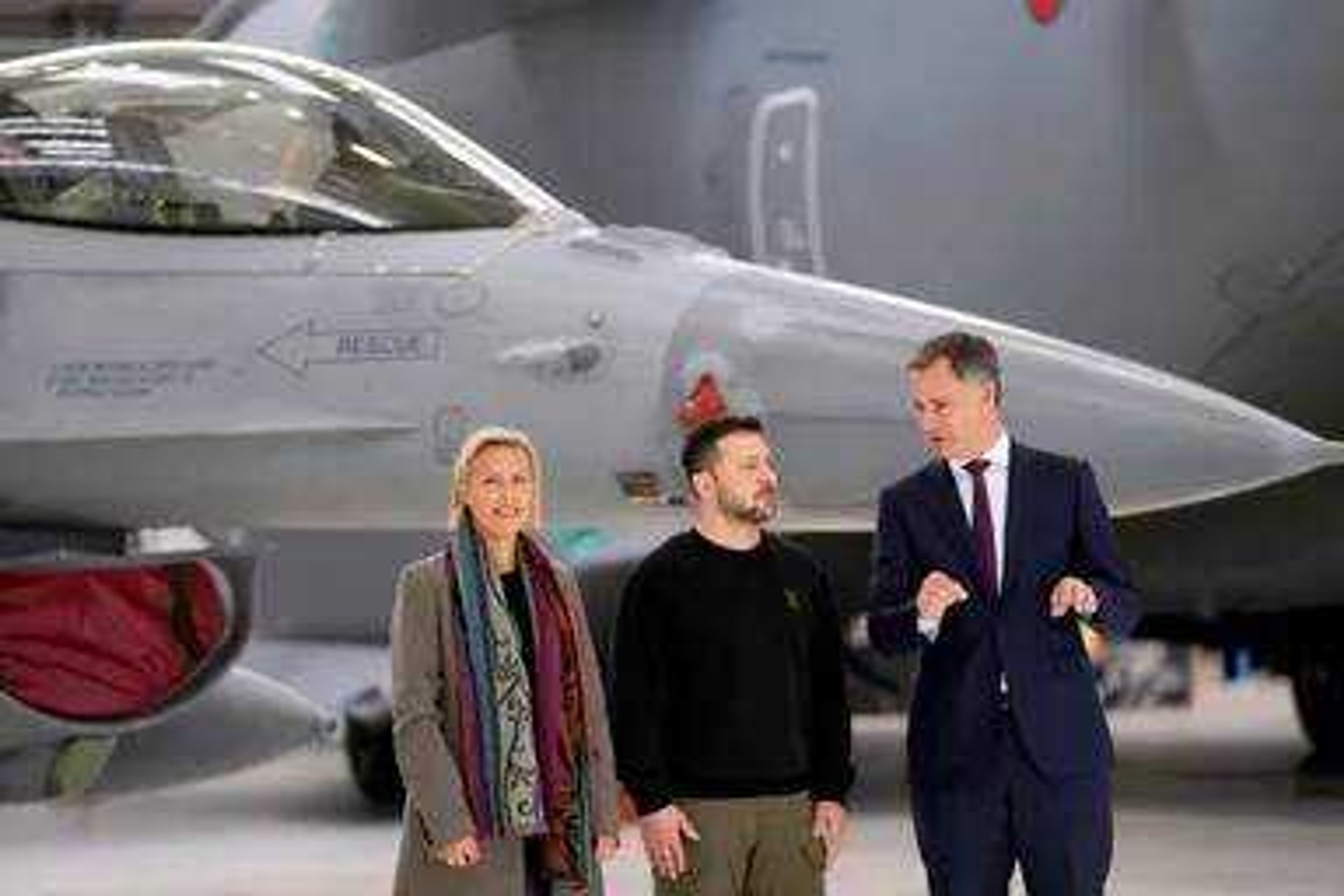 Belgium's Prime Minister Alexander De Croo, right, and Belgium's Defense Minister Ludivine Dedonder, left, pose with Ukraine's President Volodymyr Zelenskyy in front of an F-16 at Melsbroek military airport in Brussels, on May 28, 2024. Ukraine may keep some of the F-16 fighter jets it's set to receive from its Western allies at foreign bases to protect them from Russian strikes, a senior Ukrainian military officer said Monday June 10, 2024. Belgium, Denmark, the Netherlands and Norway have committed to providing Ukraine with over 60 U.S.-made F-16 fighter jets to help it fend off Russian attacks. 