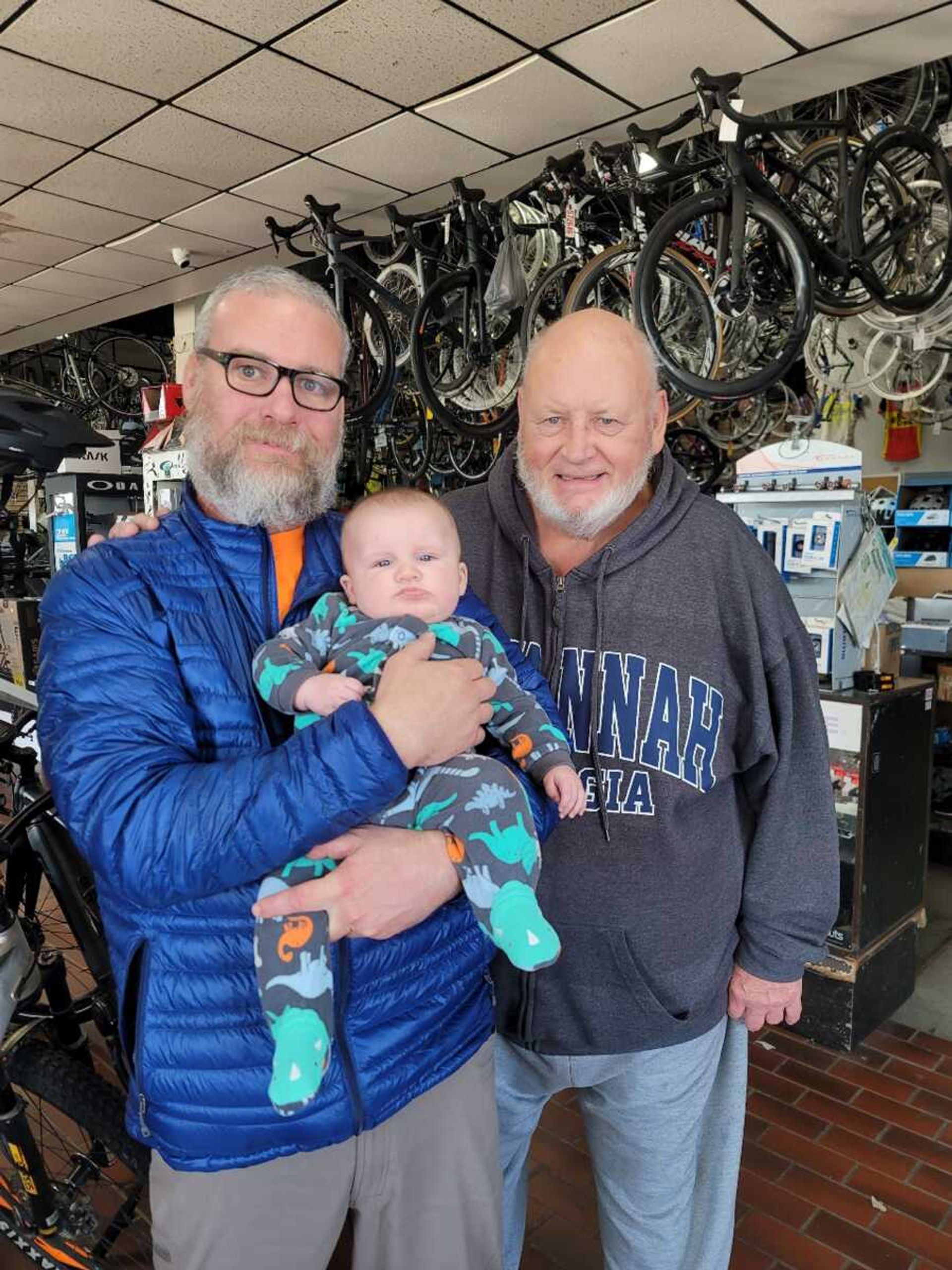 Kian Sutter is pictured with his grandson, Braxton Overy, and his father, Bill Sutter.