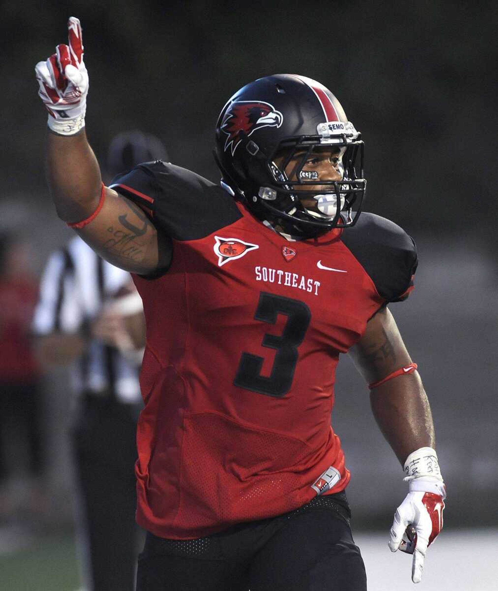 Southeast Missouri State running back Lennies McFerren punctuates his touchdown run against Southeastern Louisiana during the first quarter Saturday, Sept. 20, 2014 at Houck Stadium. (Fred Lynch)