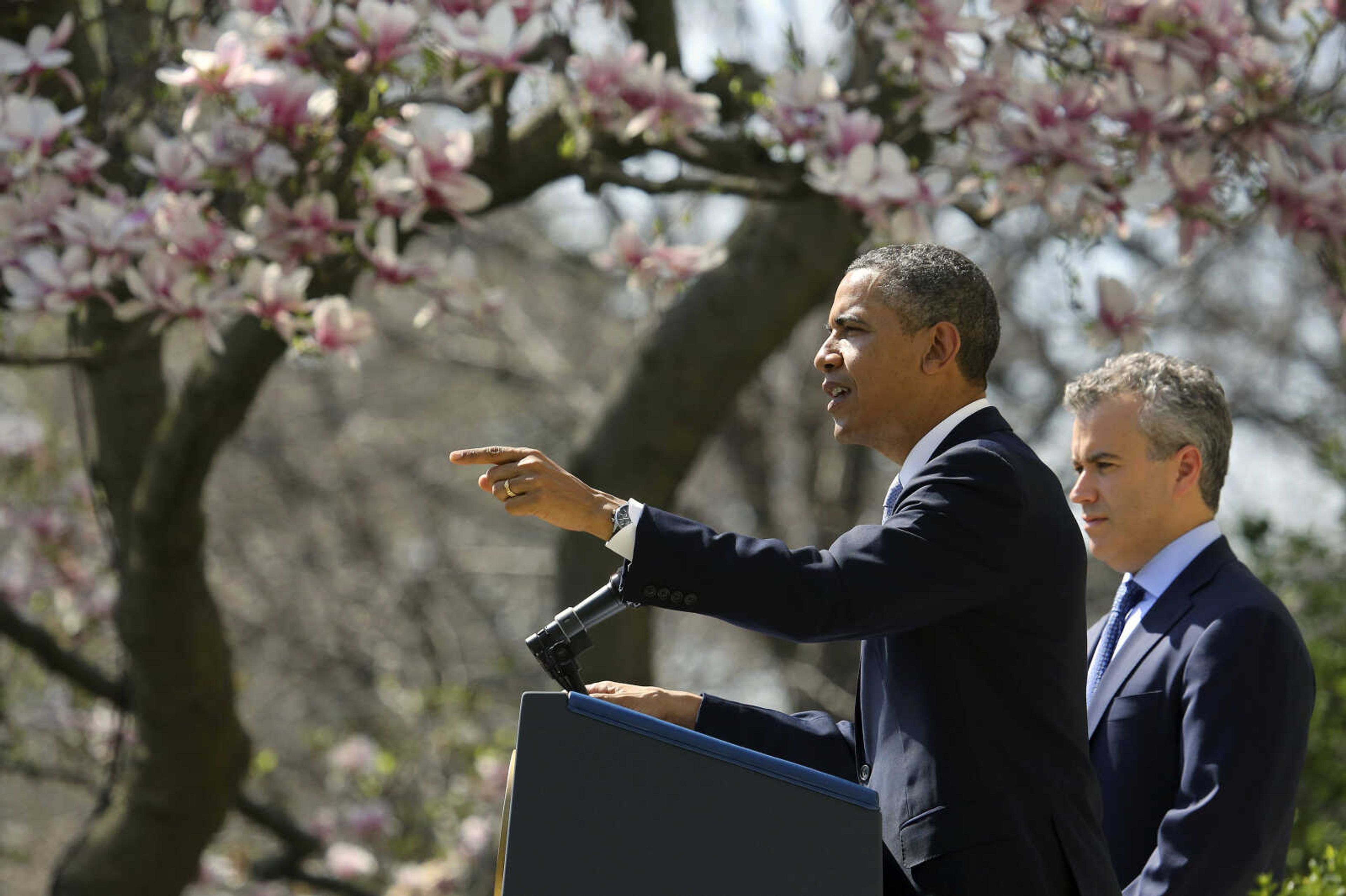 President Barack Obama, accompanied by acting Budget Director Jeffrey Zients, speaks in the Rose Garden of the White House in Washington, Wednesday April 10, 2013, to discuss his proposes fiscal 2014 federal budget. (AP Photo/J. David Ake)