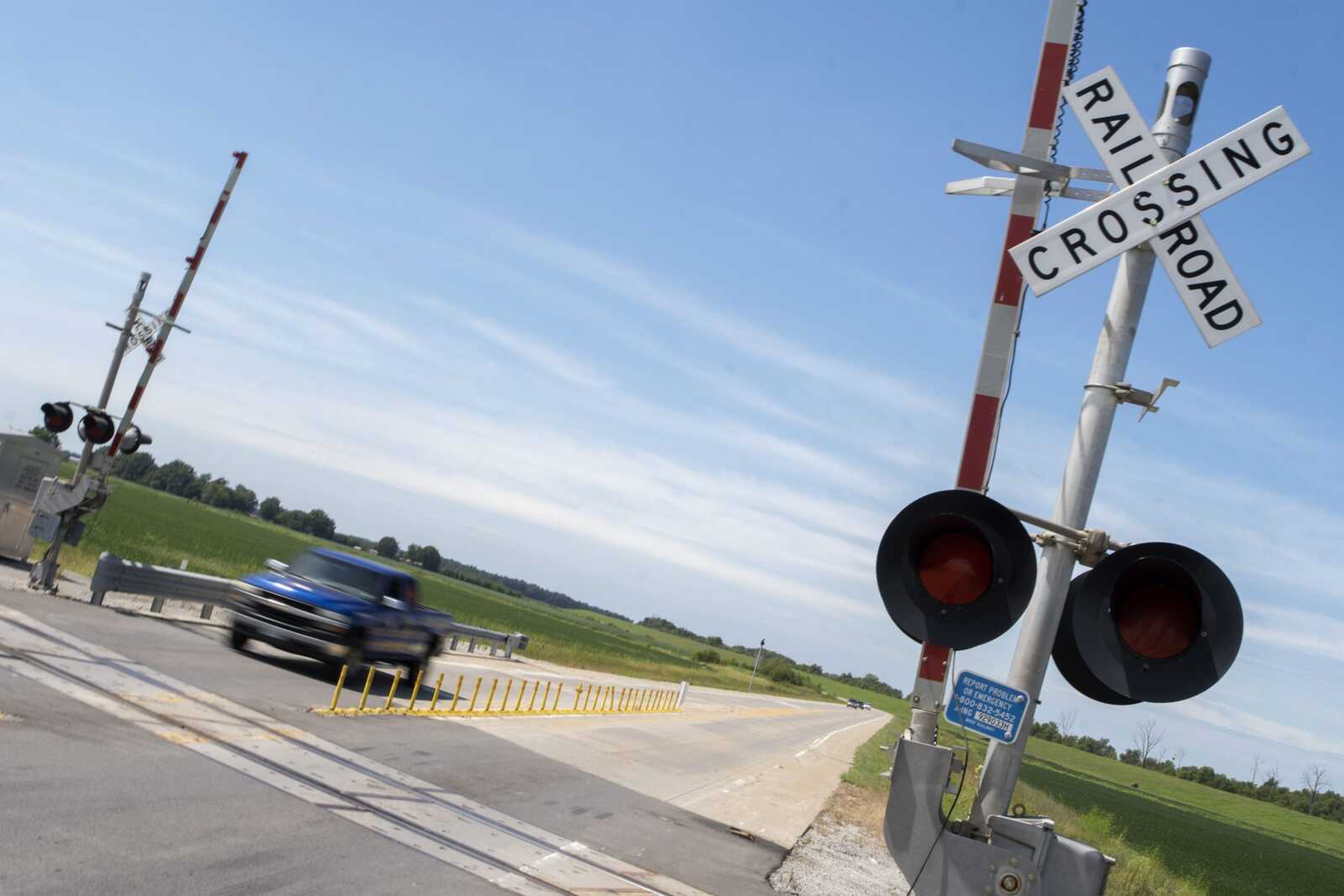 A truck makes its way through a railroad crossing on Route AB on Friday in Cape Girardeau County, west of the Nash Road industrial park.