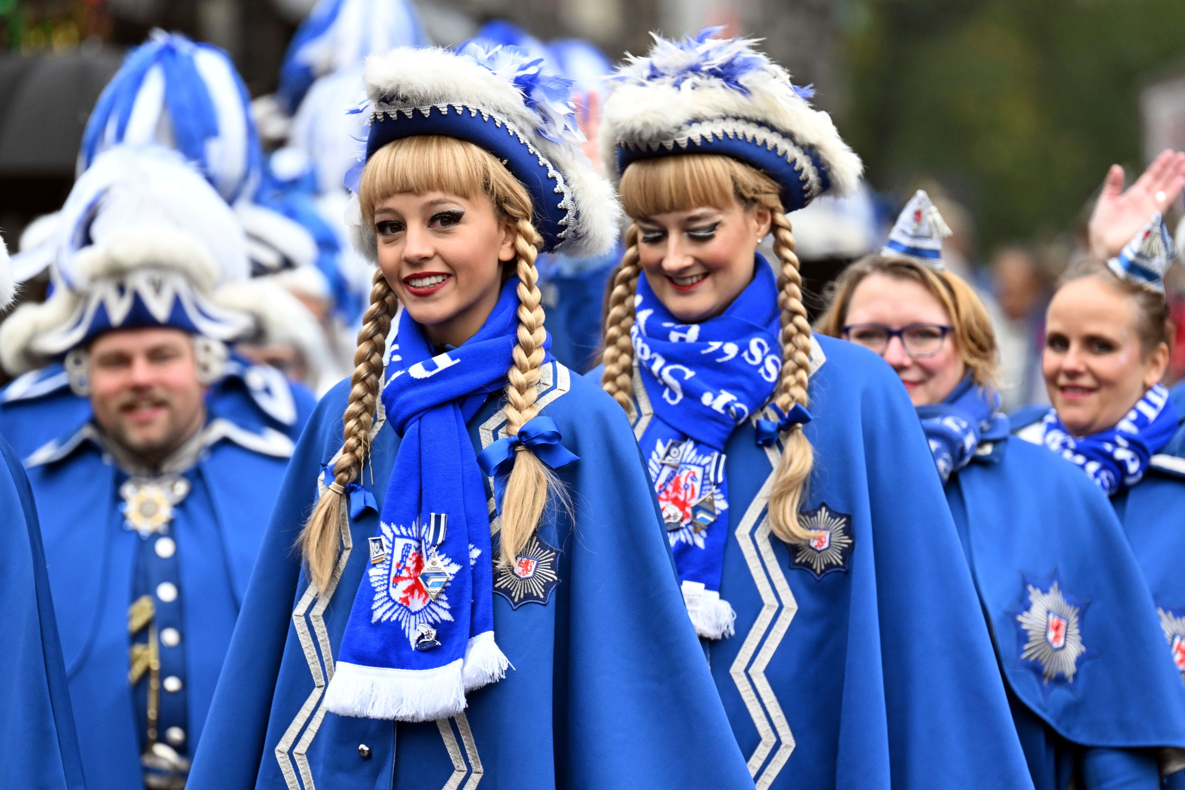 Carnival revellers celebrate the start of carnival on the market square in Duesseldorf, Germany, Monday Nov. 11, 2024. (Federico Gambarini/dpa via AP)