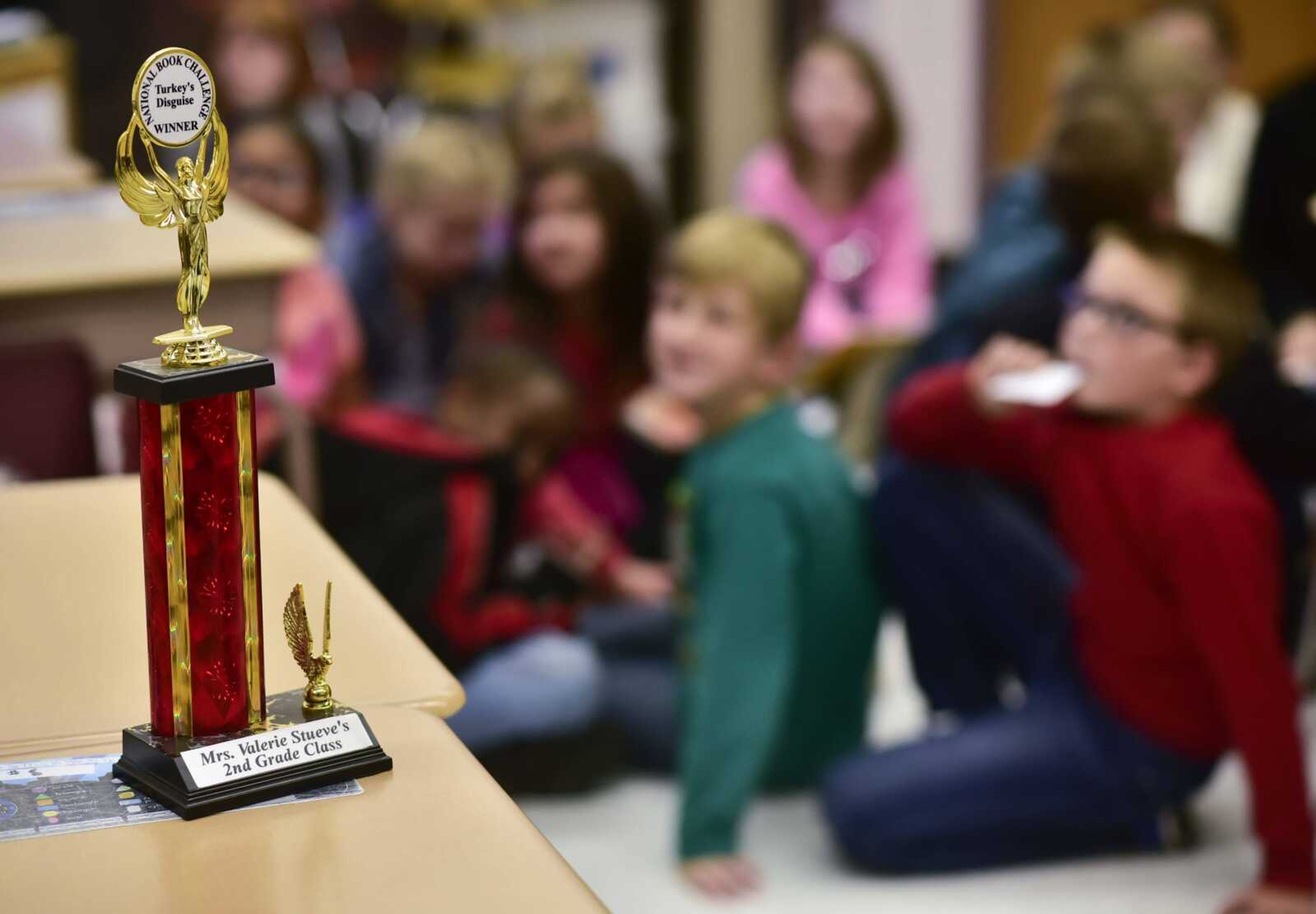 A trophy awarded to "Turkey's Disguise" for the National Book Challenge sits out on a desk Tuesday at Perryville Elementary School in Perryville, Missouri.