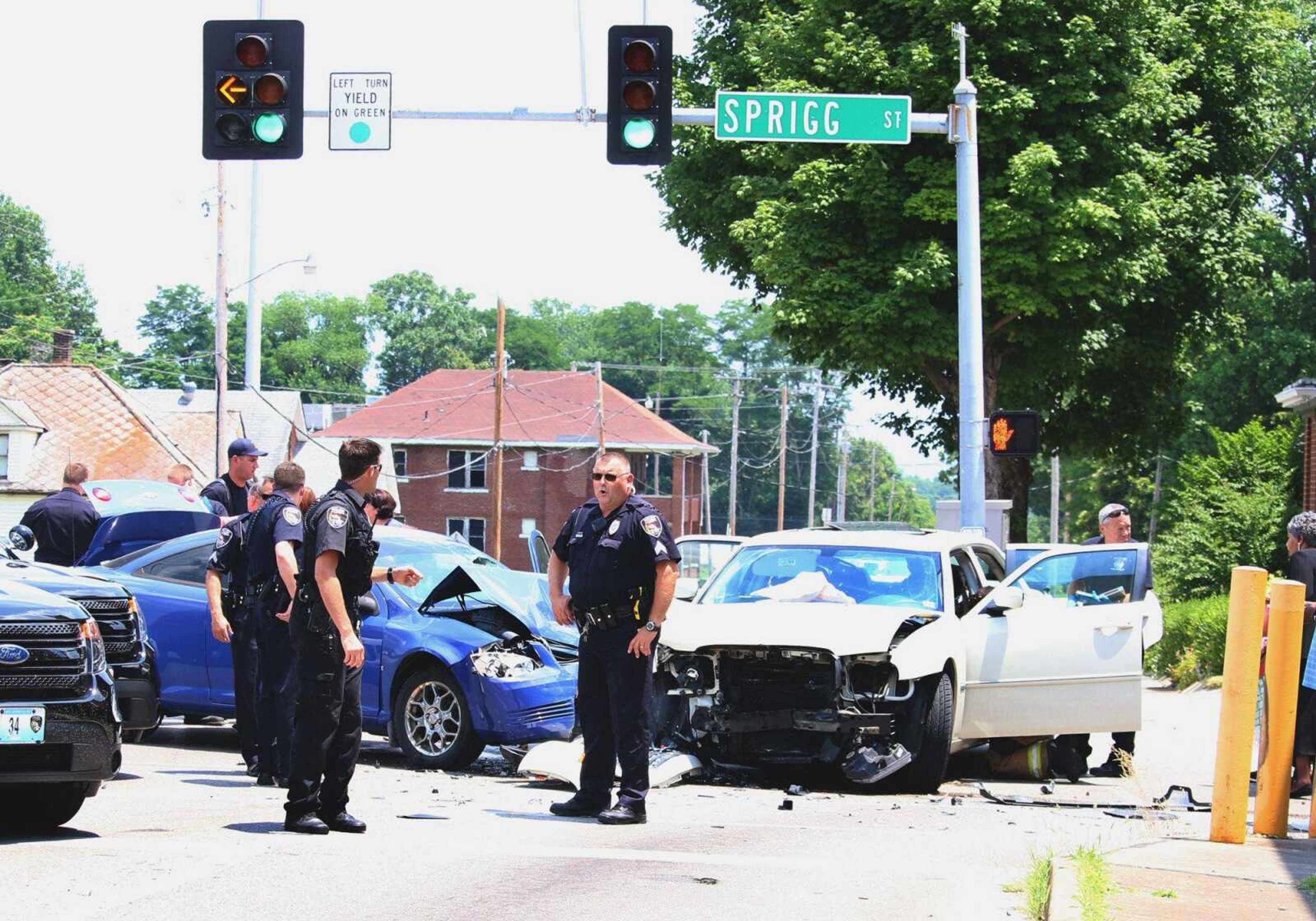 Cape Girardeau police work the scene of an accident Sunday afternoon at the intersection of William and Sprigg streets. Police said least one person was taken to Saint Francis Medical Center for treatment of a laceration.