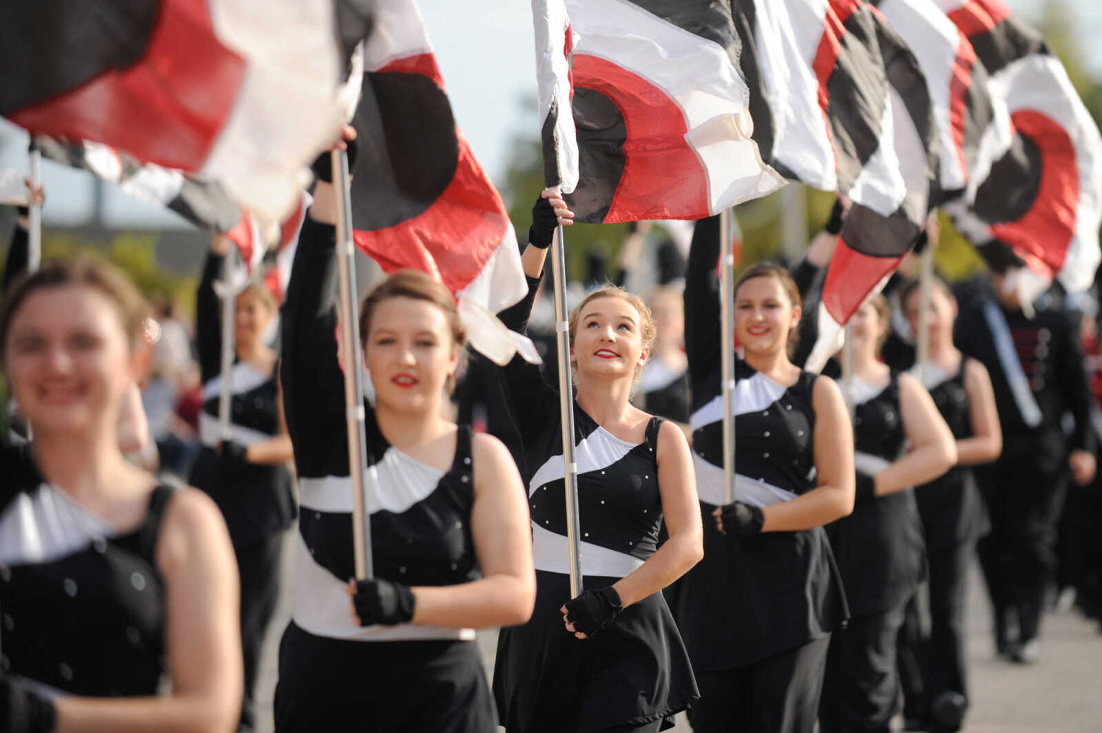 GLENN LANDBERG ~ glandberg@semissourian.com

Members of the Jackson High School Marching Chiefs move in formation down High Street in Uptown Jackson during the Jackson Band Festival parade Tuesday, Oct. 6, 2015.