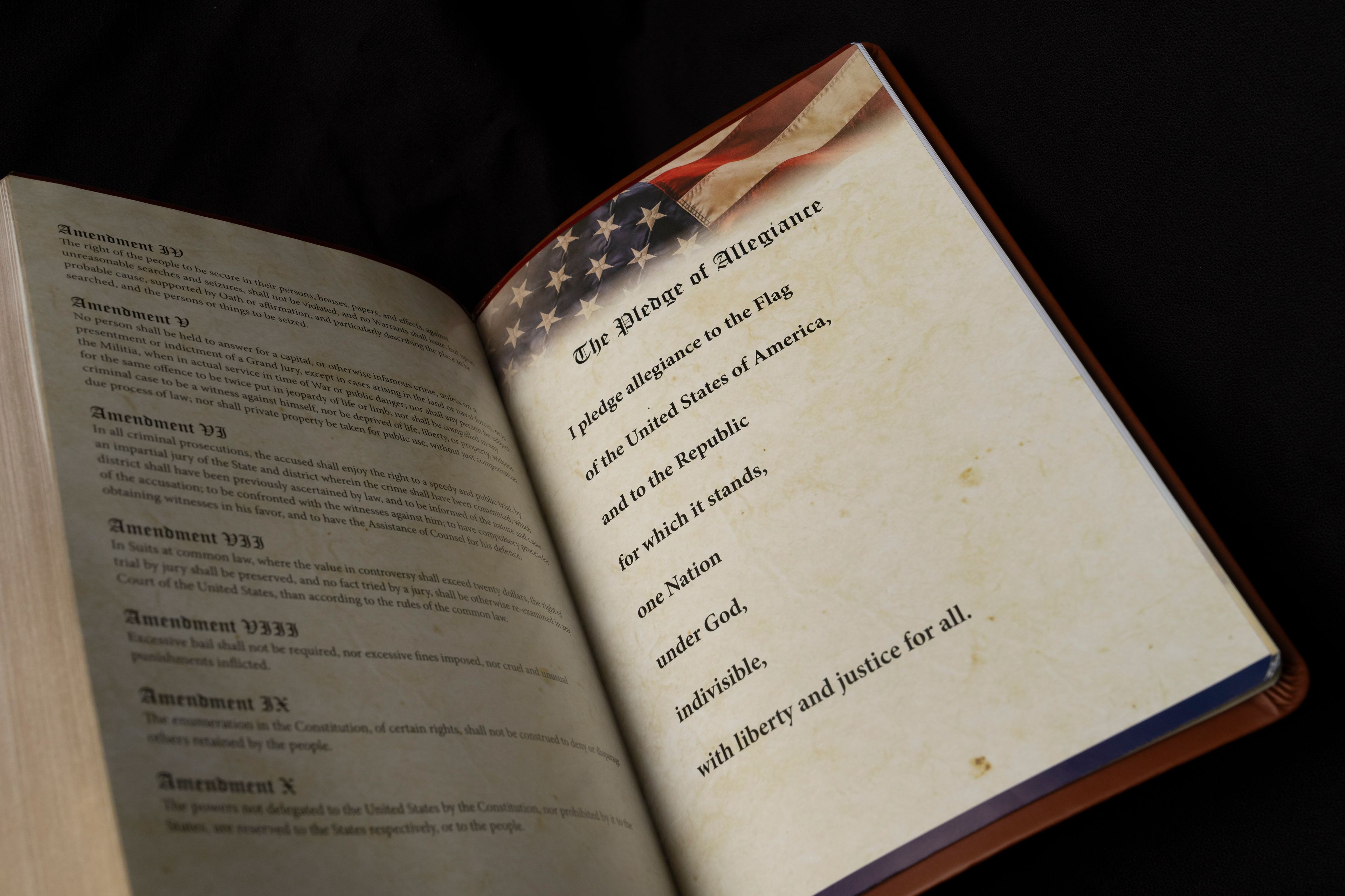 The Pledge of Allegiance is printed in Republican presidential nominee former President Donald Trump's "God Bless the USA" Bible in Washington, Tuesday, Oct. 8, 2024. (AP Photo/Ben Curtis)