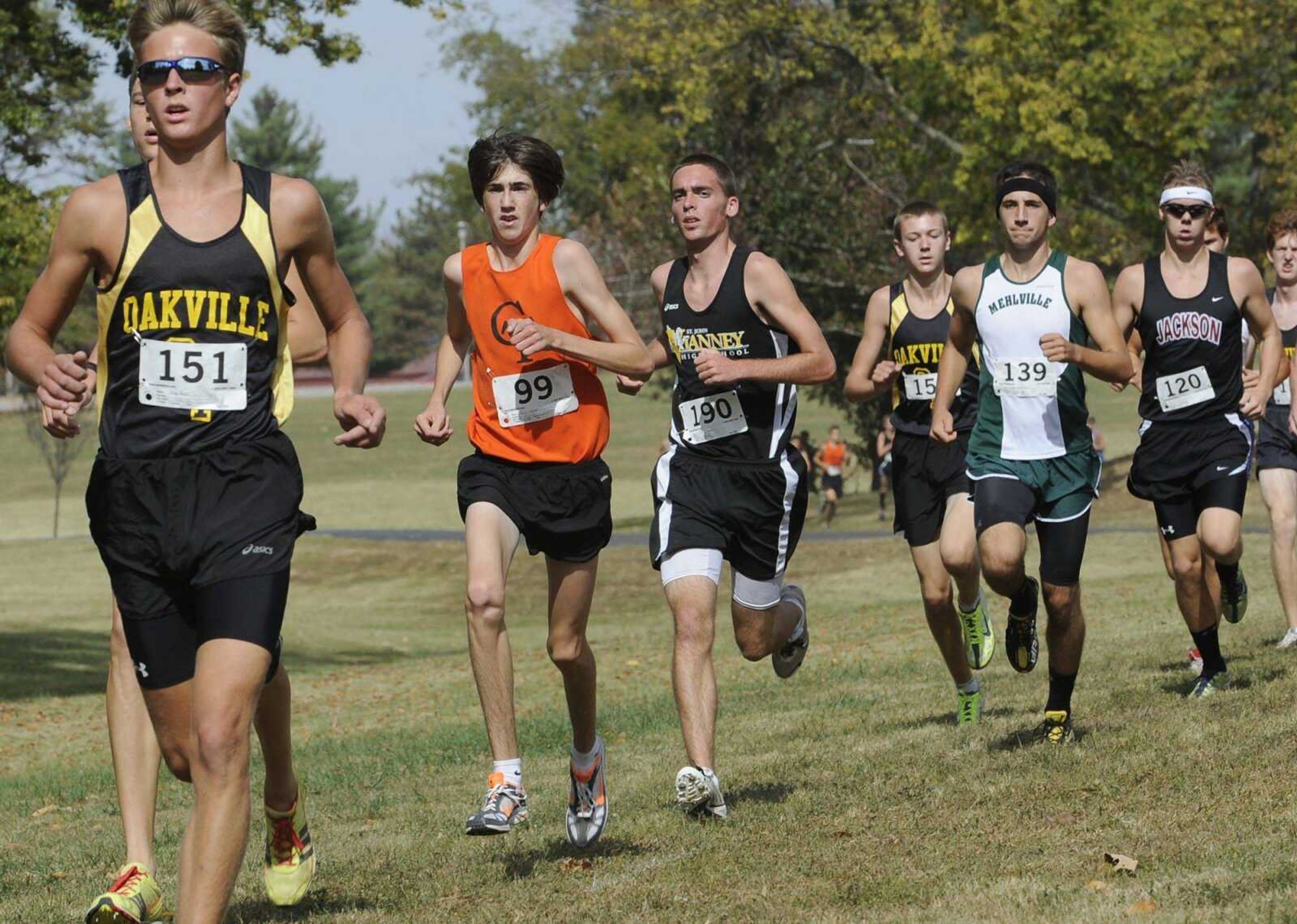 Central's Eric Schott (99) runs with the pack during the Class 4 District 1 meet Saturday at Jackson City Park. (Fred Lynch)