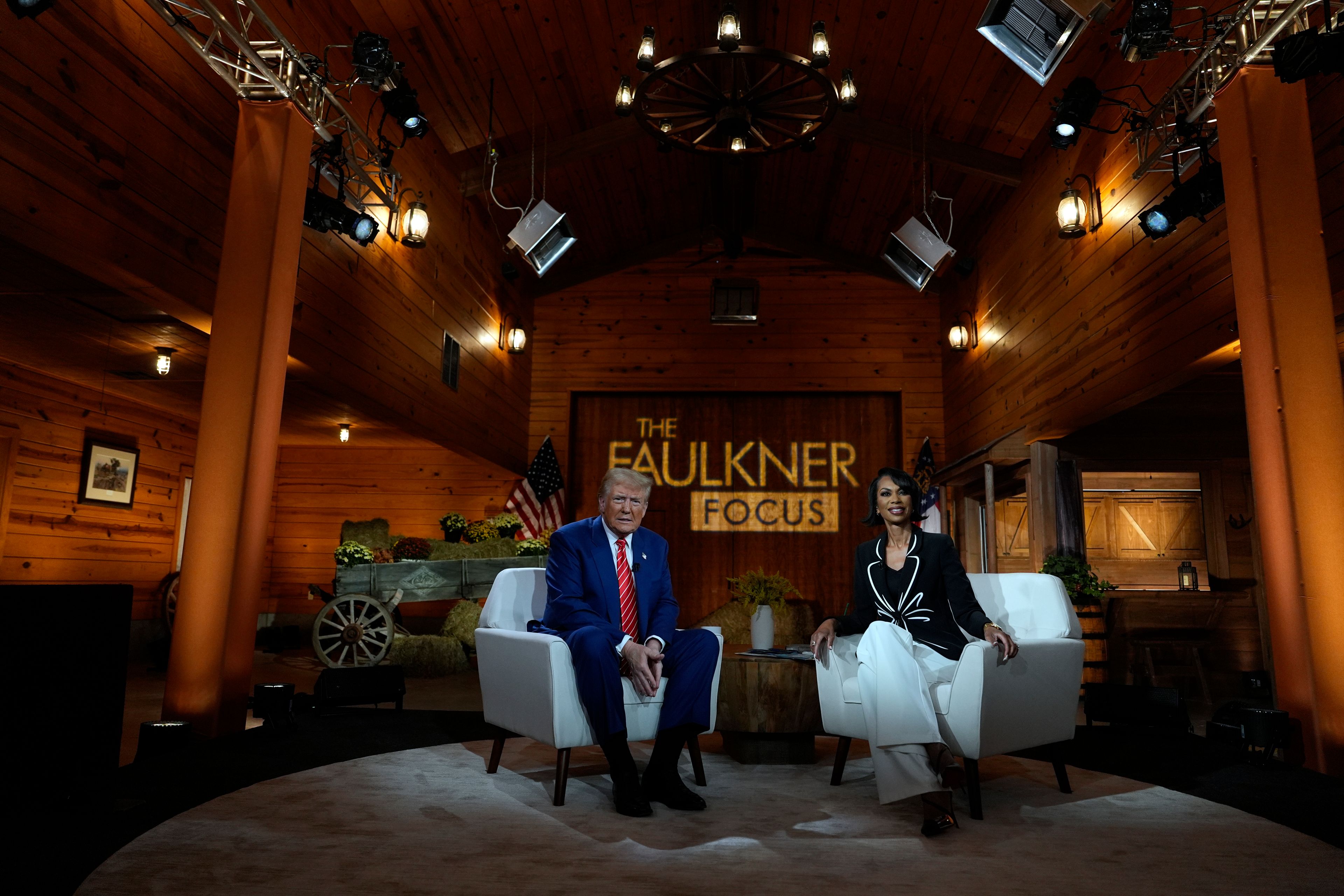 Republican presidential nominee former President Donald Trump speaks during a break in a Fox News town hall with Harris Faulkner at The Reid Barn, Tuesday, Oct. 15, 2024, in Cumming, Ga. (AP Photo/Julia Demaree Nikhinson)