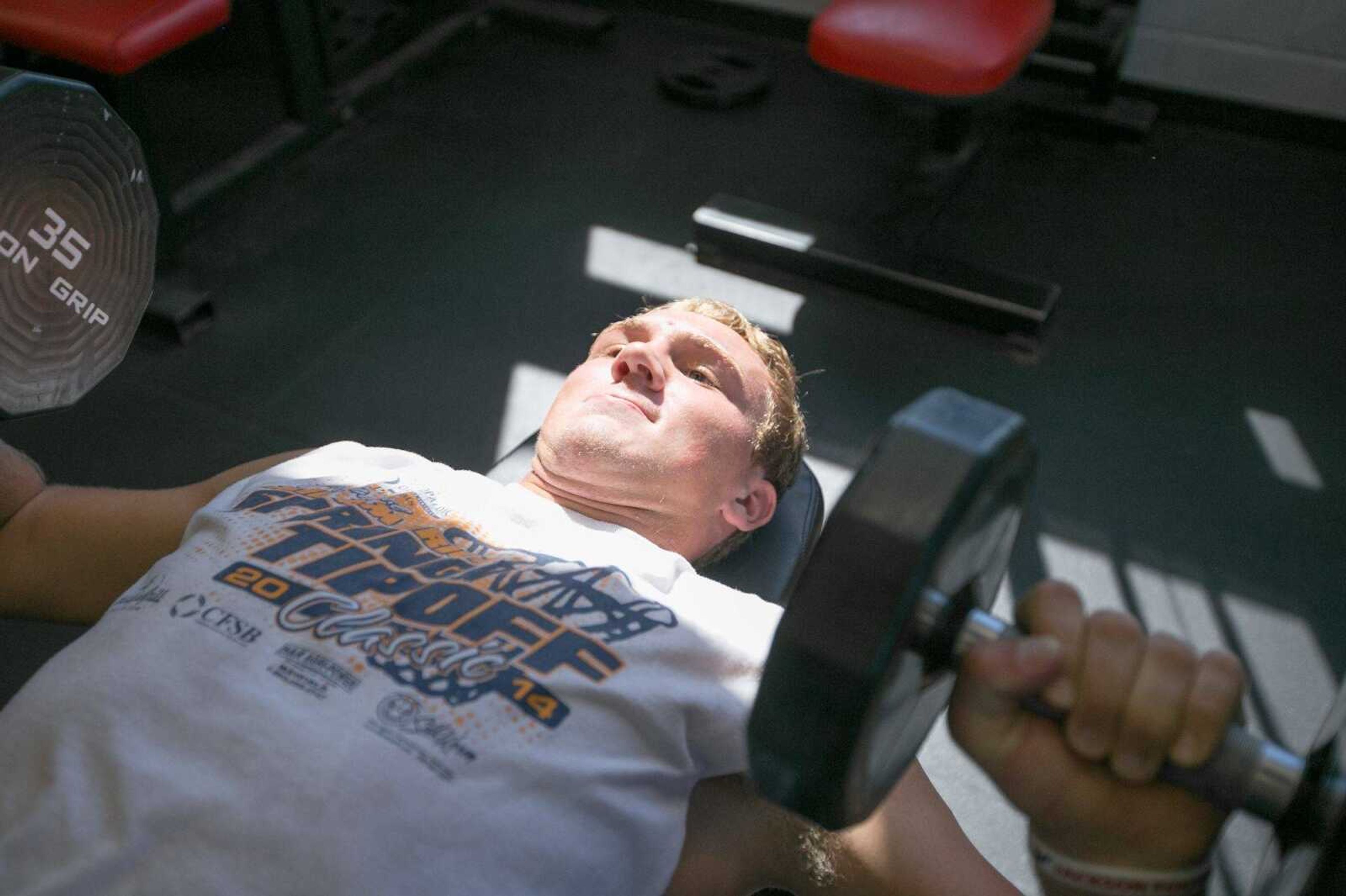 Jackson's Nick Freeman lifts weights during a workout before practice Tuesday, Aug. 11, 2015 at Jackson High School. (Glenn Landberg)