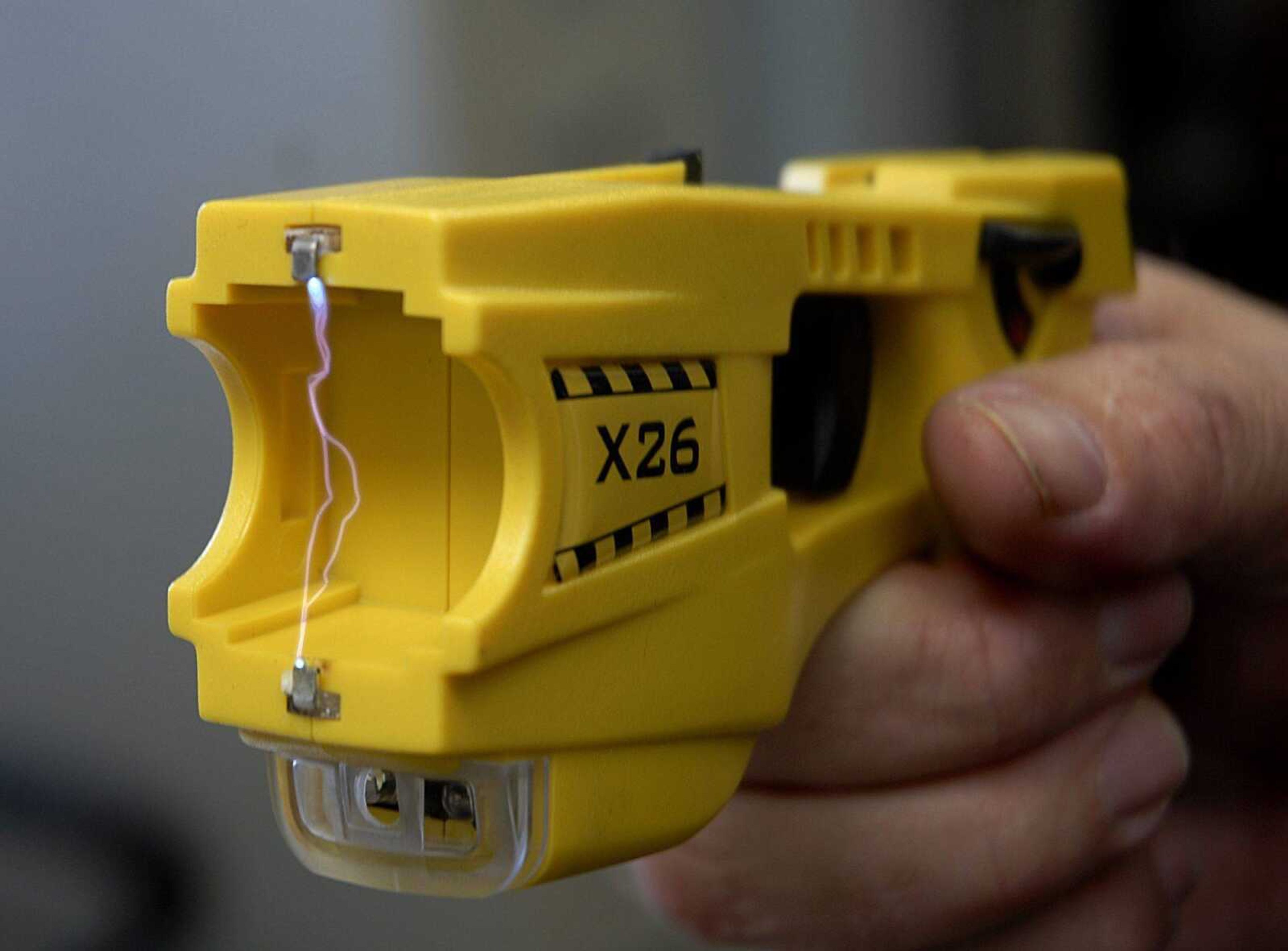 The Taser is designed to deliver 50,000 volts of electricity to a subject with a current of 0.0021 amps. (Aaron Eisenhauer)