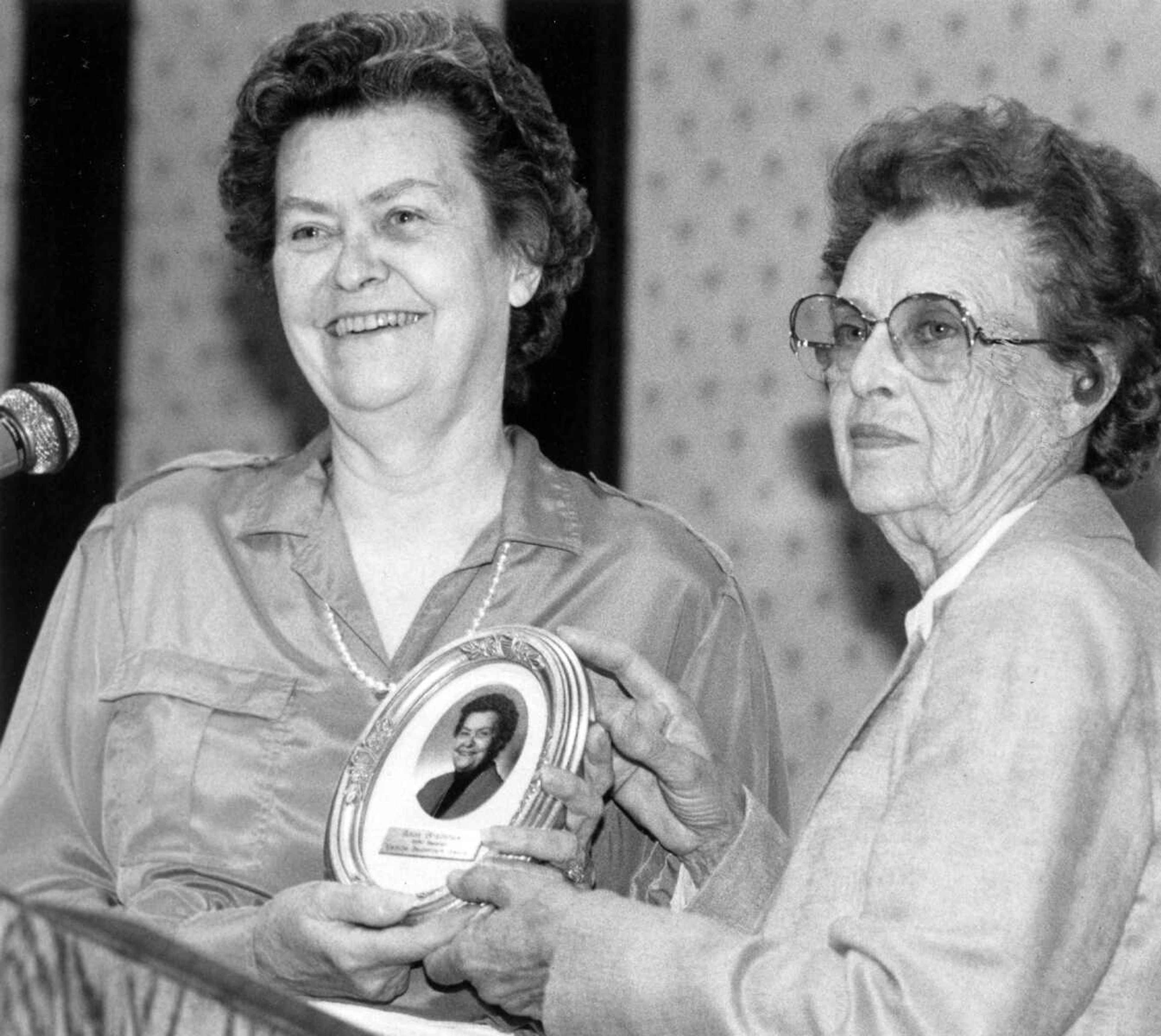 Published April 29, 1990.
Anne Bradshaw, left, charter member of the Saint Francis Medical Center Auxiliary, was presented the 1990 Vernice Baumstark Award at the auxiliary's annual luncheon at the Drury Lodge. Presenting the award was auxiliary president, Mary Margaret "Boots" Staley. (Southeast Missourian archive)